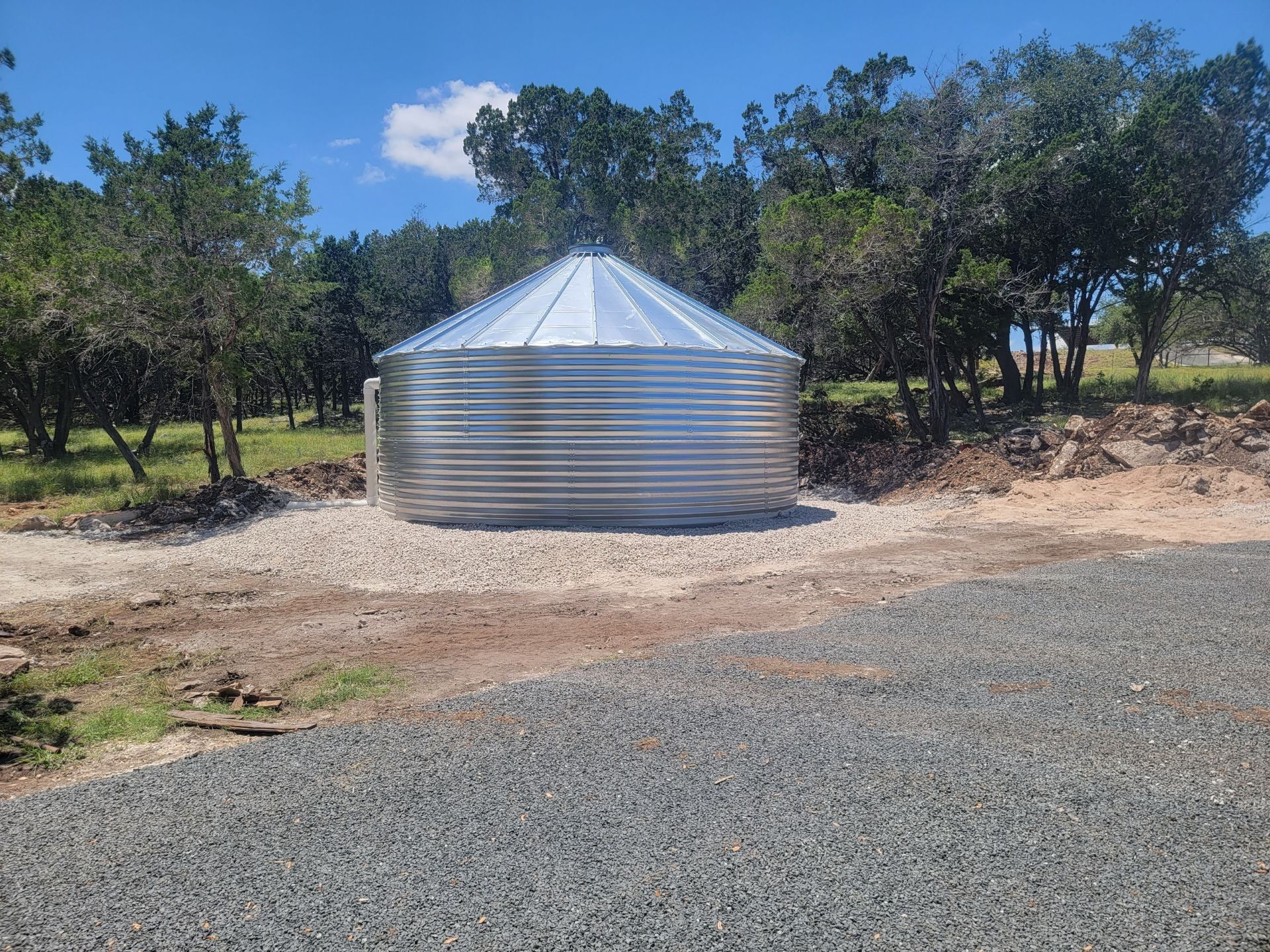 150K Equestrian center with 25K backup tank for potable water. by Hill Country Rain Water
