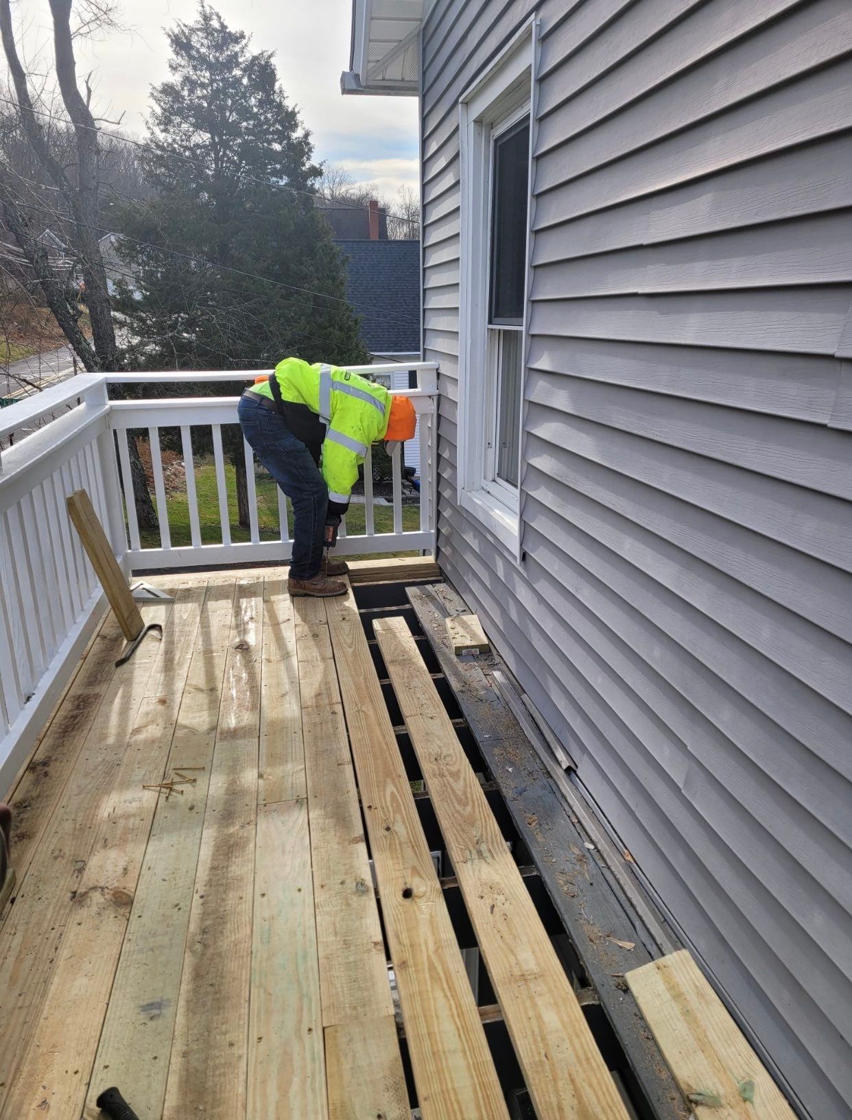 Deck Installation using Pressure treated railing by A Plus Exterior