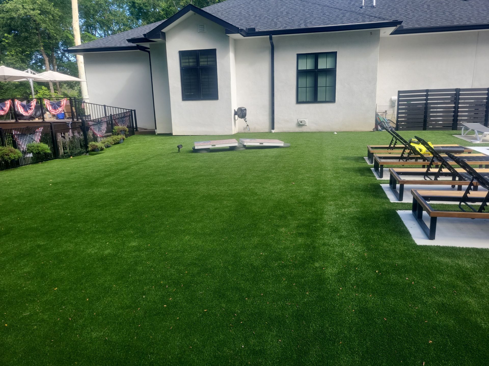 High-End Residential Turf Surrounding Pool in Powell by Southwest Greens Midwest