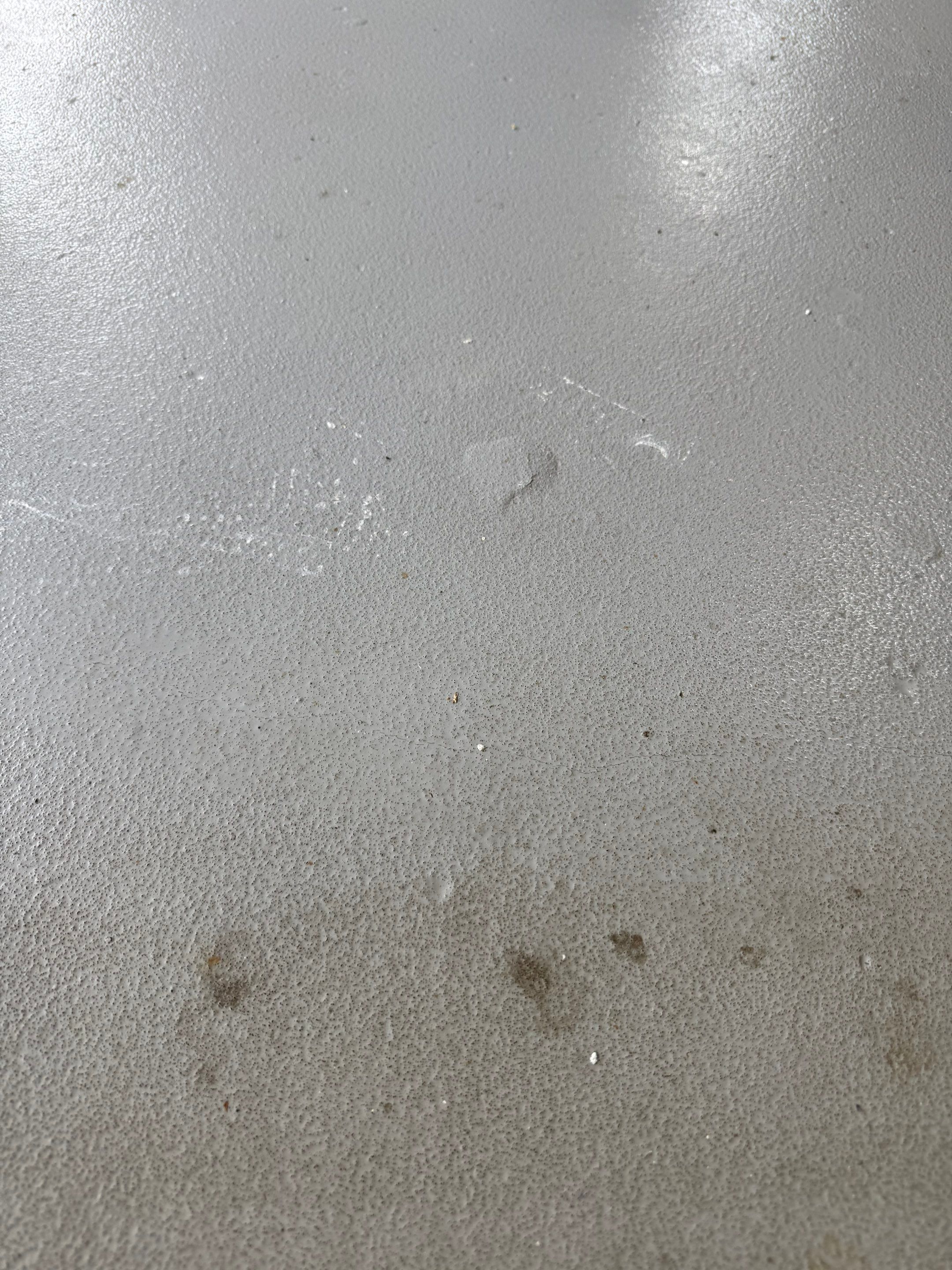 Custom Polyaspartic Garage Floor and Stairwell Coating in Pipestone by Select Painting, Coatings & Garage Cabinets