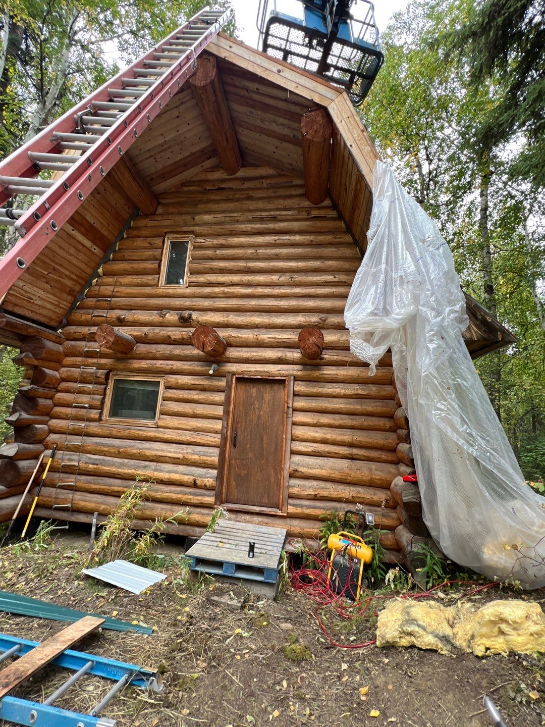 Log Cabin Staining by Midnight Sun Painting