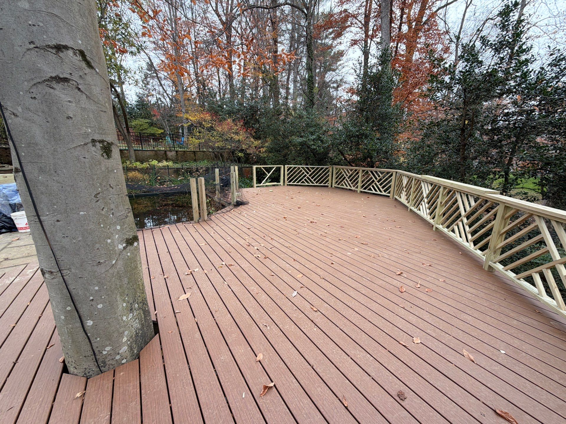 Custom Composite Deck Replacement with Geometric Railing in Bethesda, MD by Jakari Restoration & Construction LLC