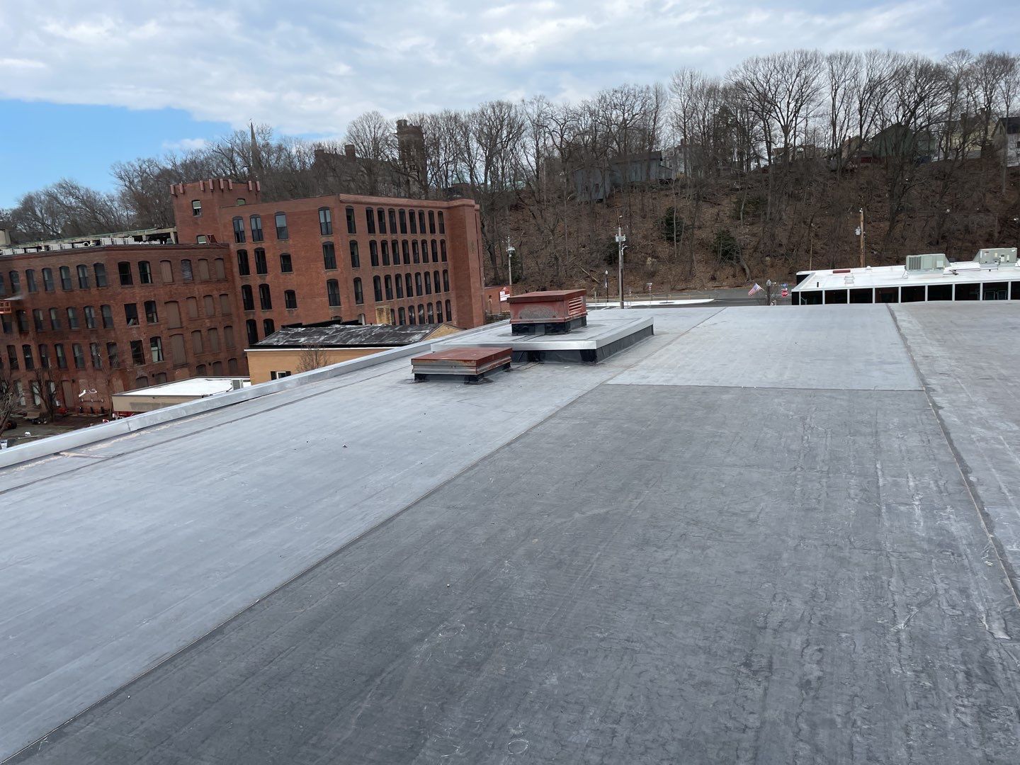 Commercial Roofing Installation using EPDM  by A Plus Exterior