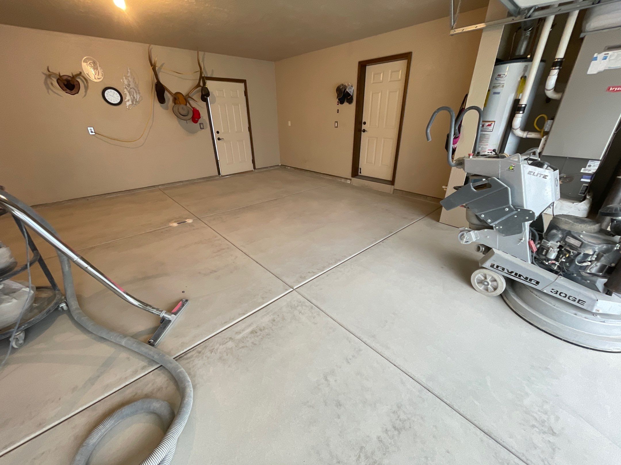 Garage Transformation using Pebble Beach and Front Porch using Greystone by Croc Coatings, LLC