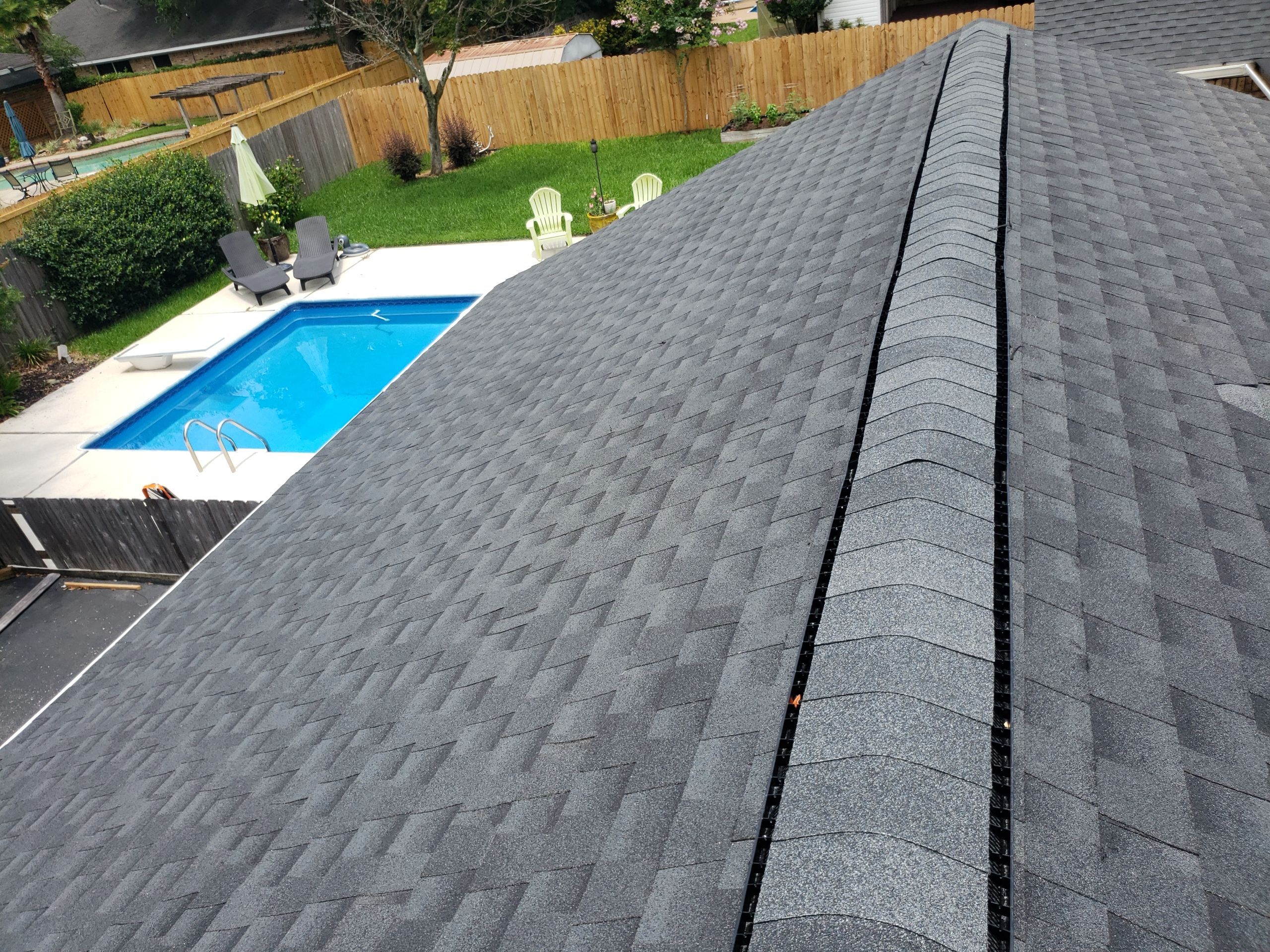 Residential Roofing Installation using Roof Replacement by American Roofing & Construction LLC