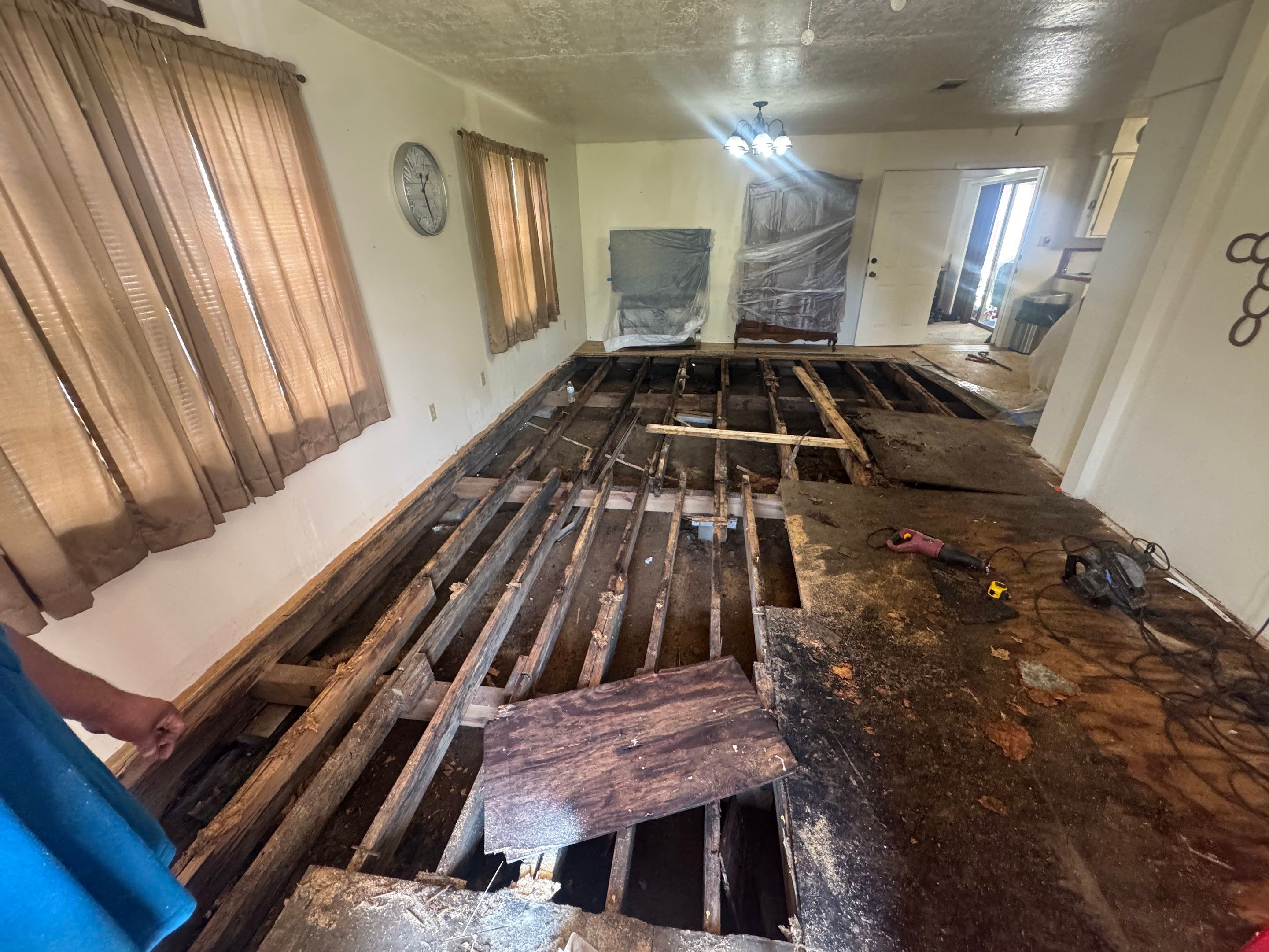 Water dry rotted flooring by Harden Enterprise Services LLC