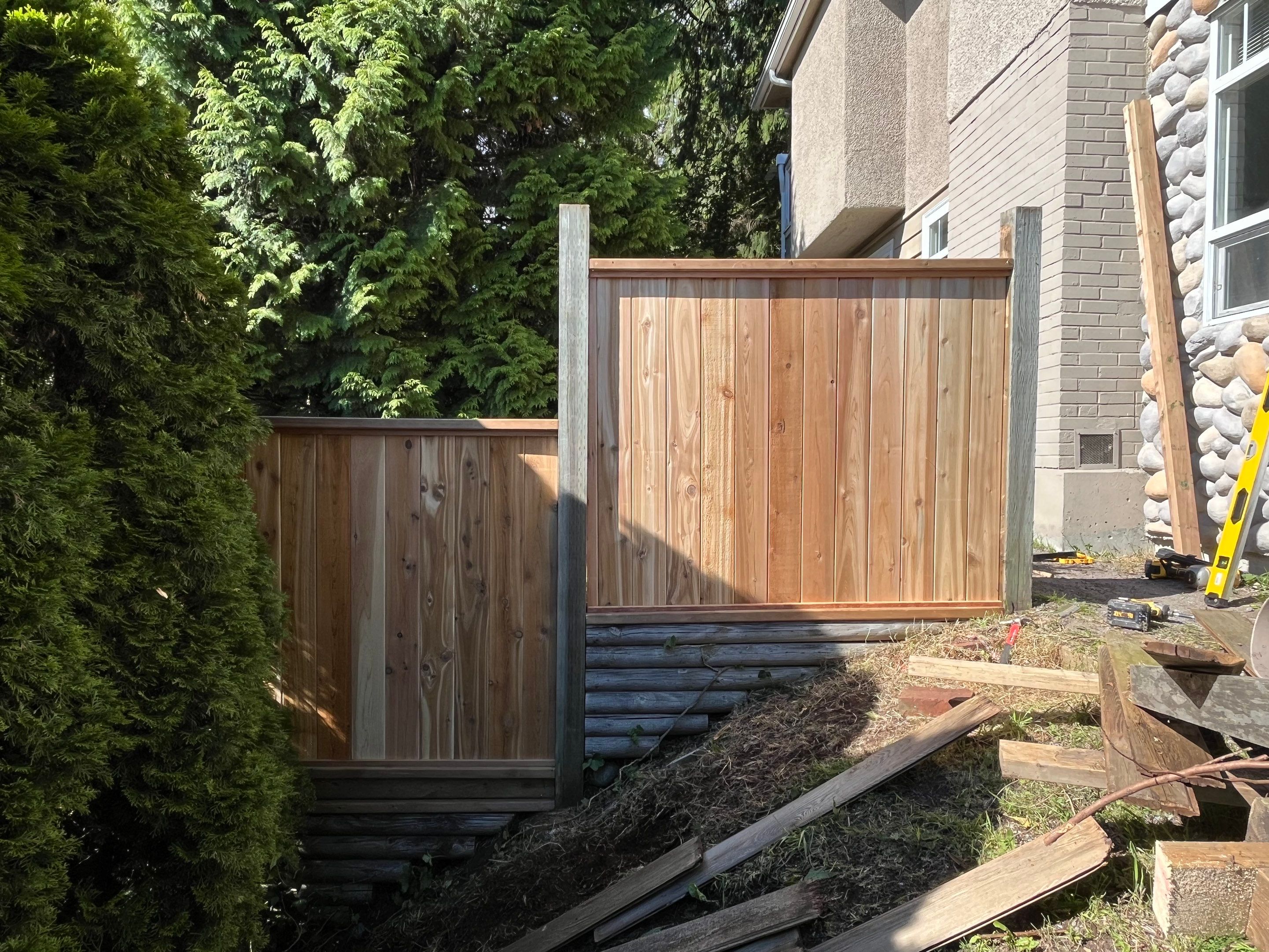 New Fence Installation - Edgemont Village by YVR Construction Group