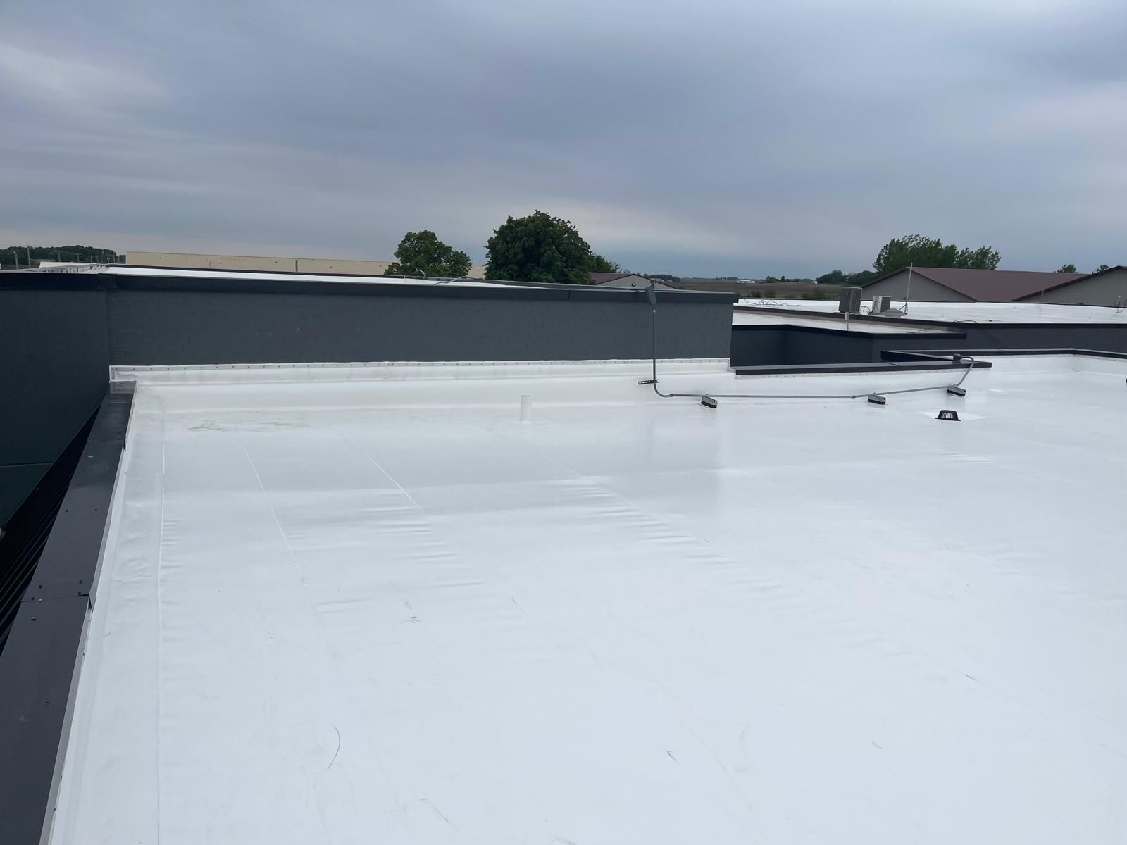 Iowa Select Farms- Commercial PVC Roof Installation by Grell Roofing, LLC