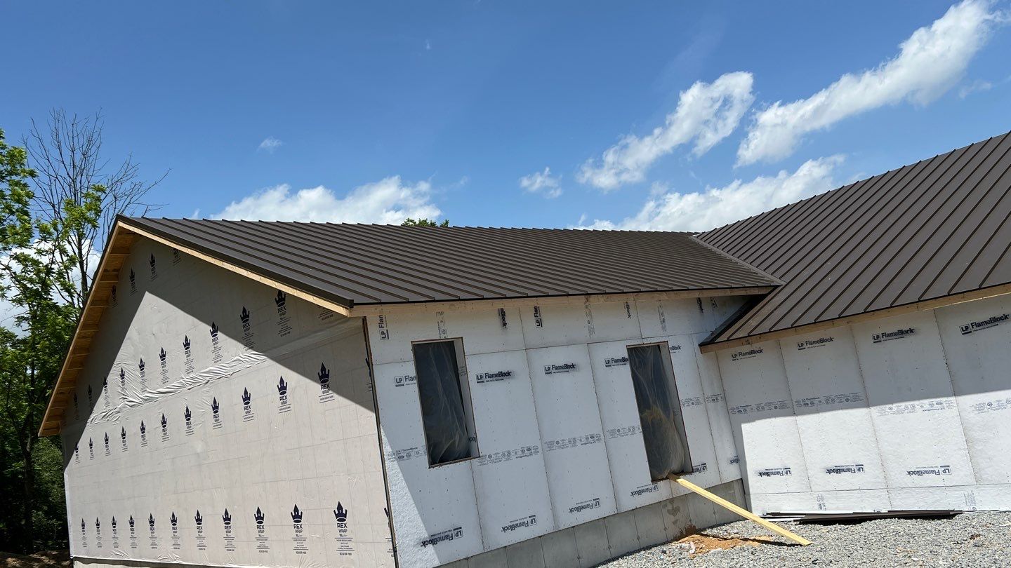 Commercial Roofing Installation using Standing Seam Metal - Burnished Slate Frost by RoofX 