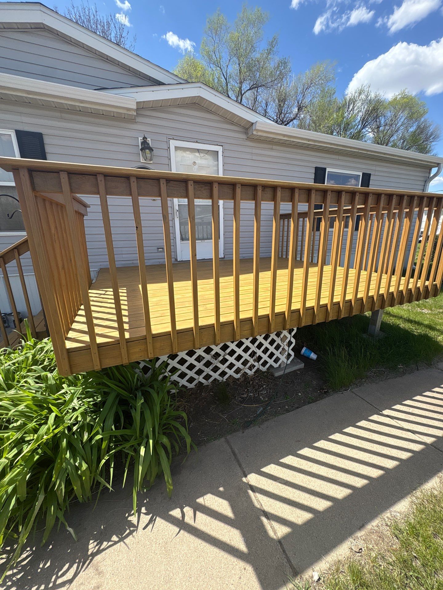 Wood Deck Staining and Interior Paint Refresh in Sioux Falls by Select Painting, Coatings & Garage Cabinets