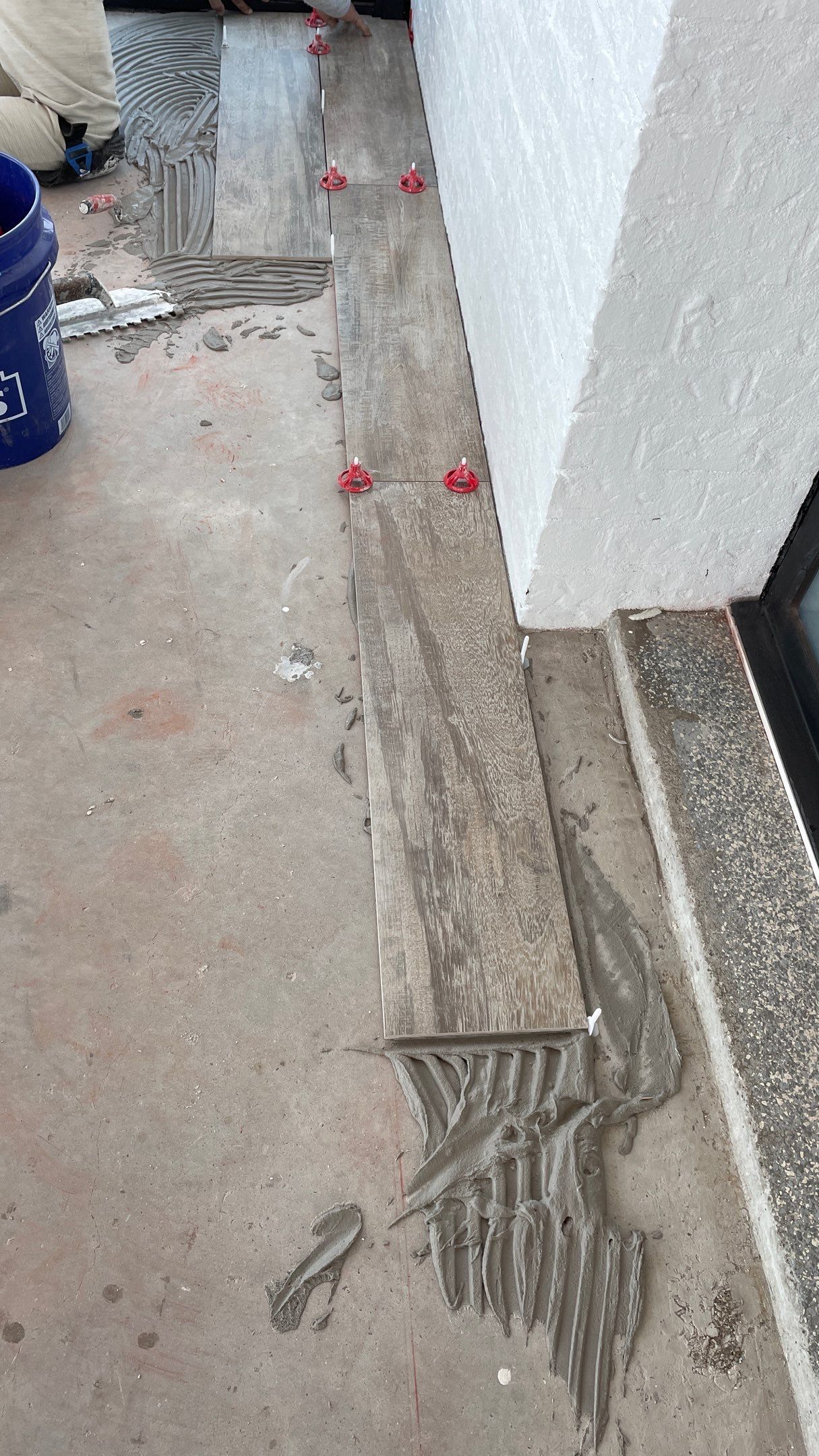 Instant Transformation of this Beautiful Sunroom by Footprints Floors of Coastal Carolina