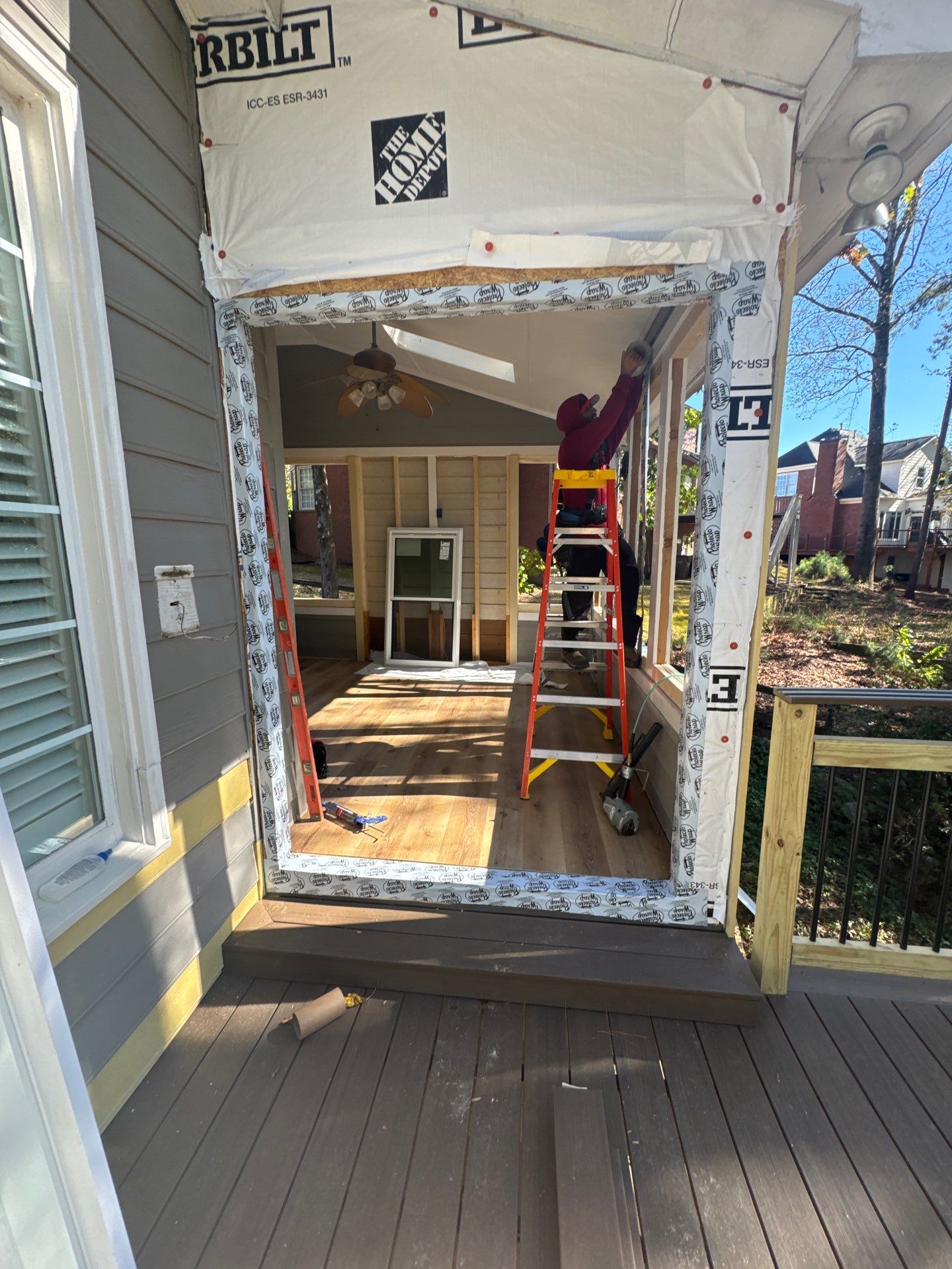 Custom Multi-Level Composite Deck and Sunroom Addition in Suwanee by Swift Home Renovations 