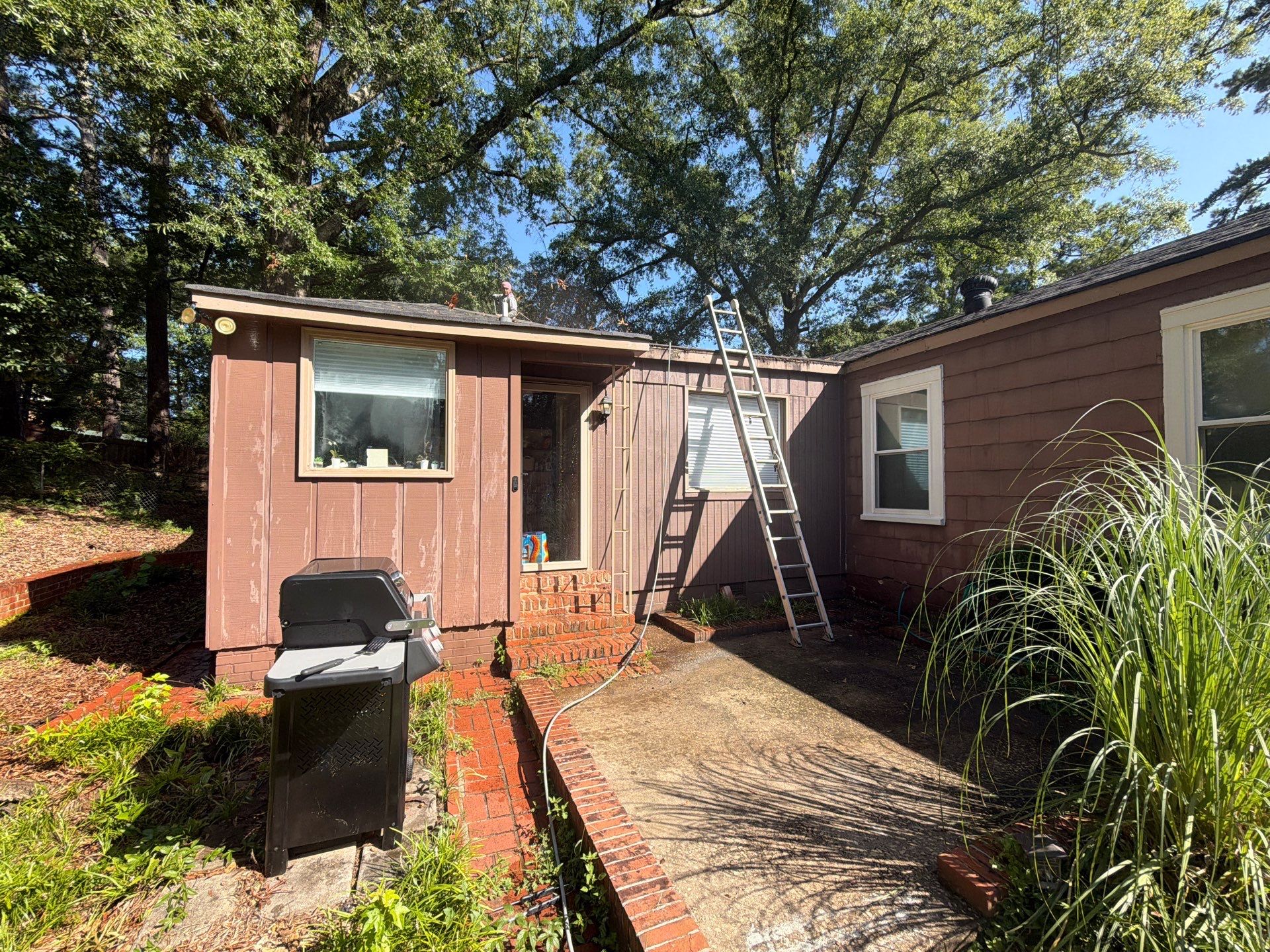Full Exterior Repaint with Navy Blue and White Trim by Swift Home Renovations