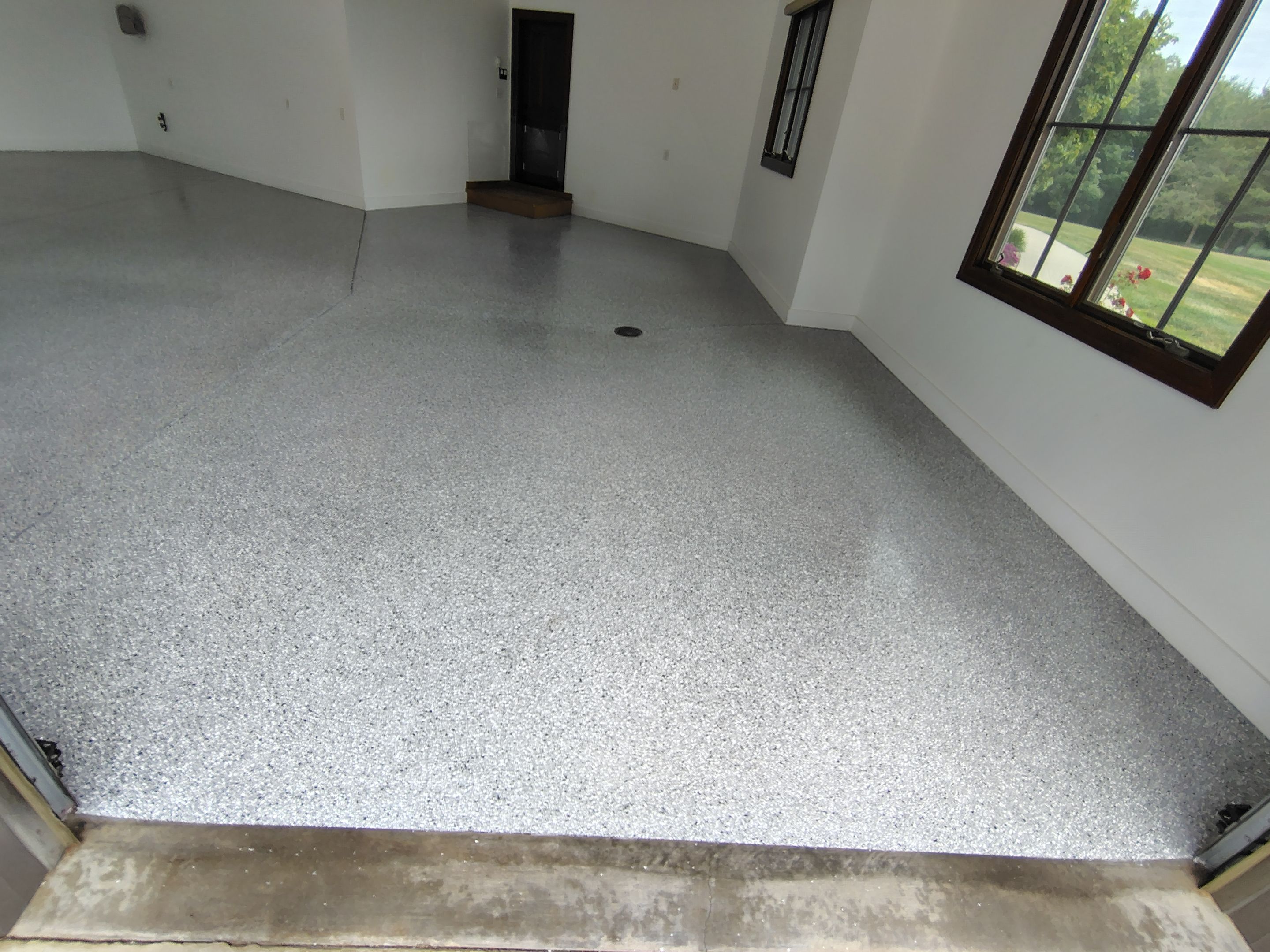 Feather Grey Floor Coating in Sioux Falls, SD by Select Painting, Coatings & Garage Cabinets
