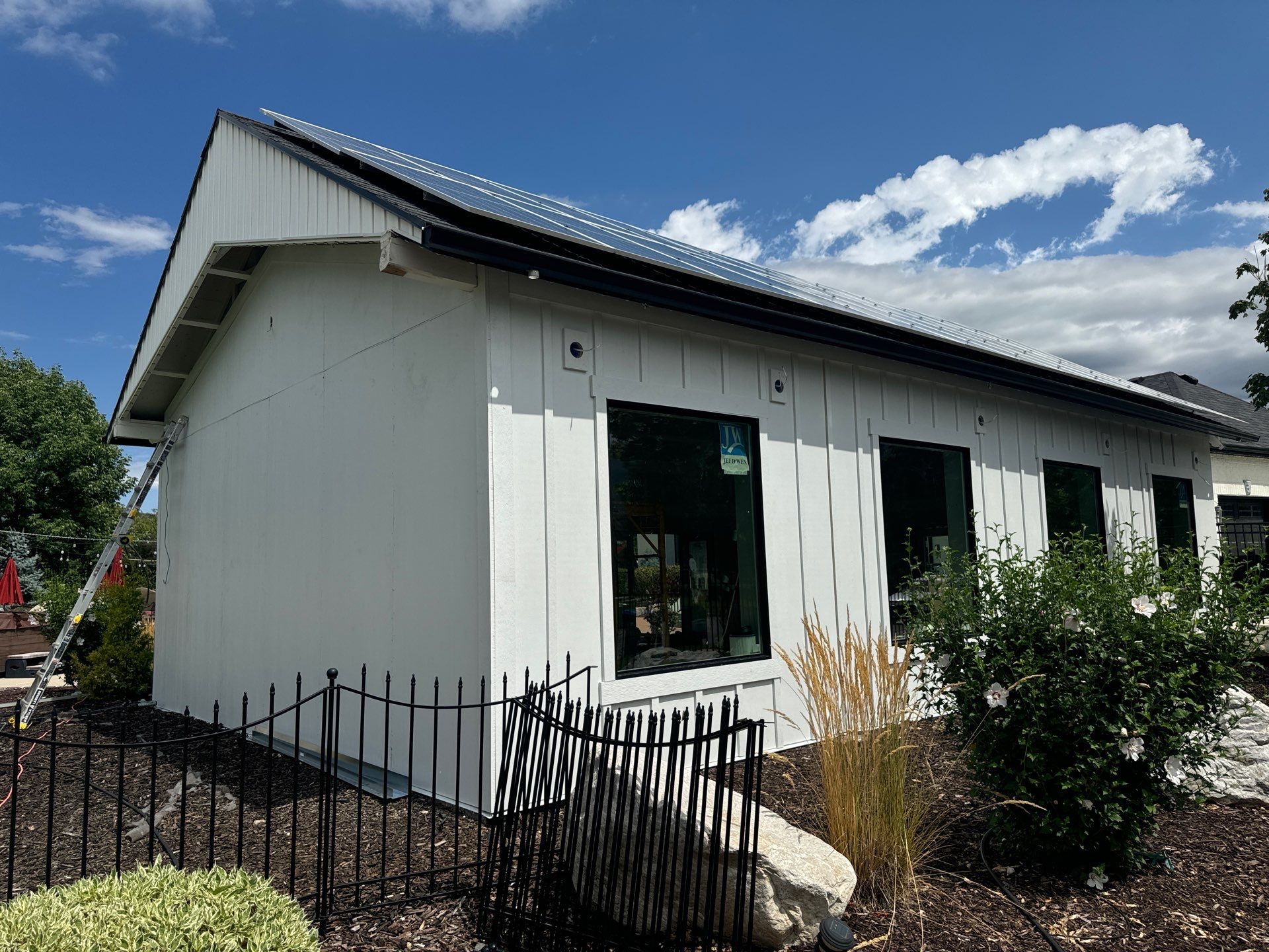 Highland | Modern Farmhouse Board & Batten | Arctic White & Black by Ideal Siding Utah