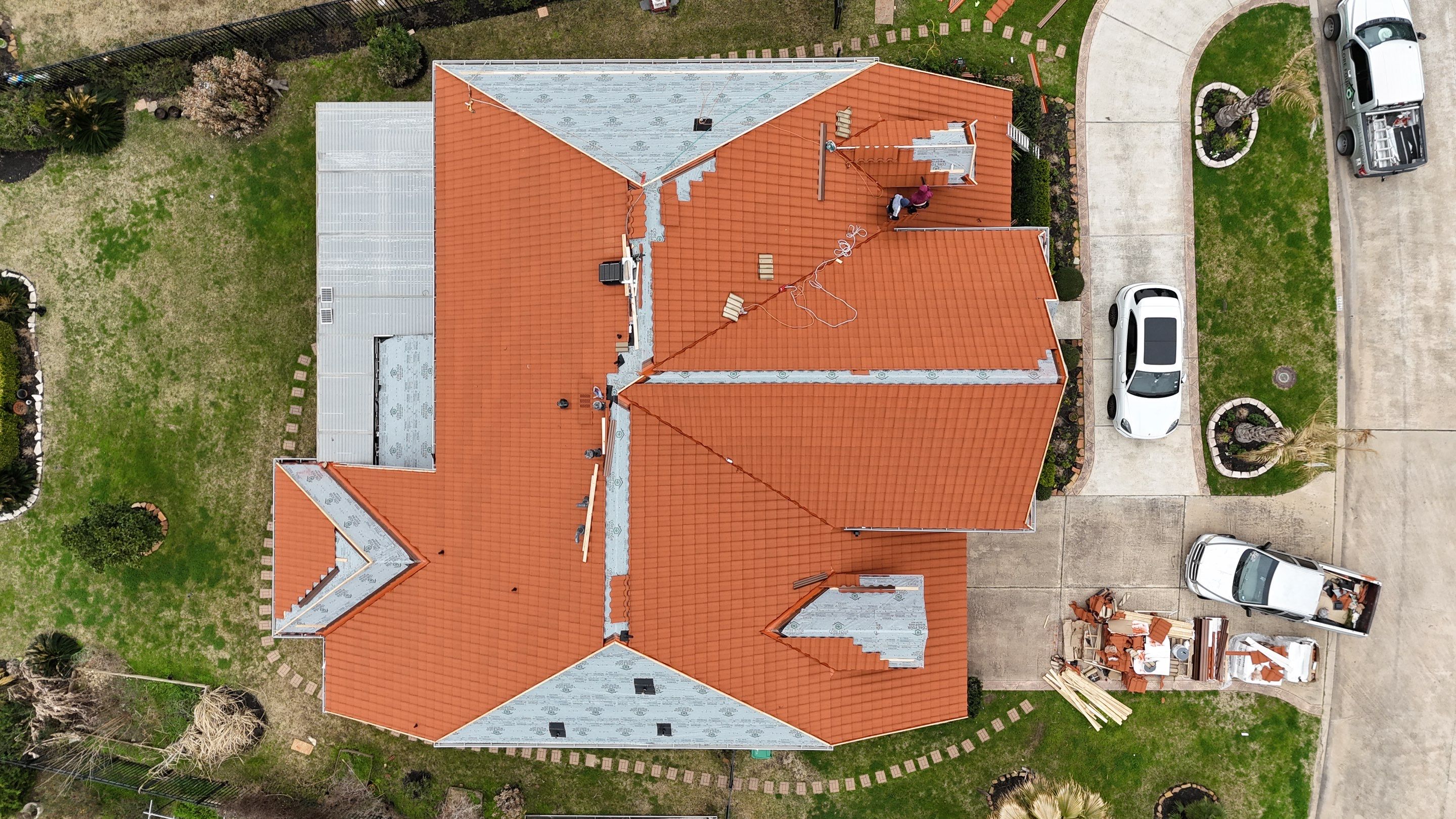 Stunning transformation using DECRA Villa Tile!  by Core Four Roofing