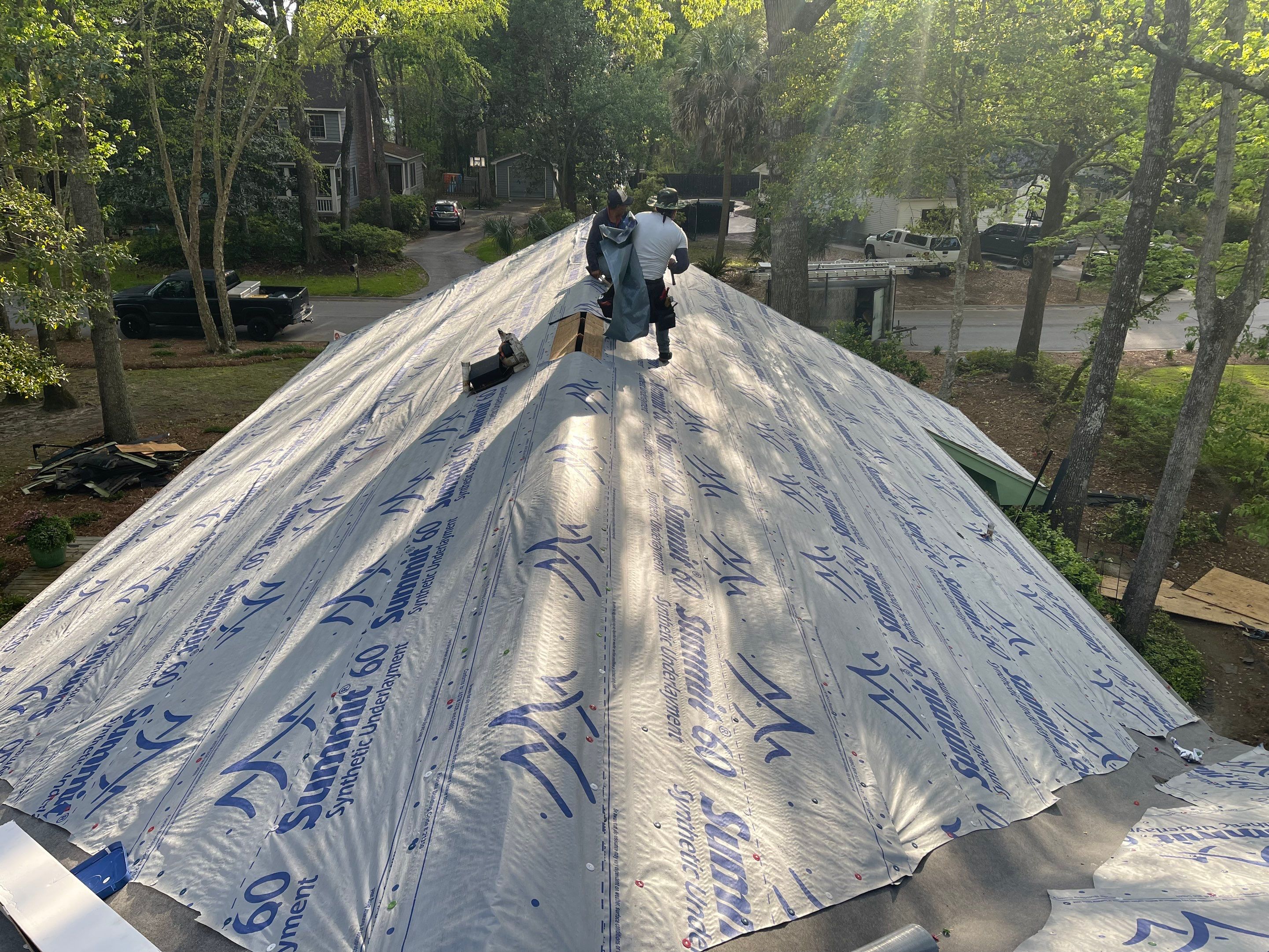 Hail Damage using Atlas Pristine Pinnacle Shingles by Artigues Roofing & Restoration Services