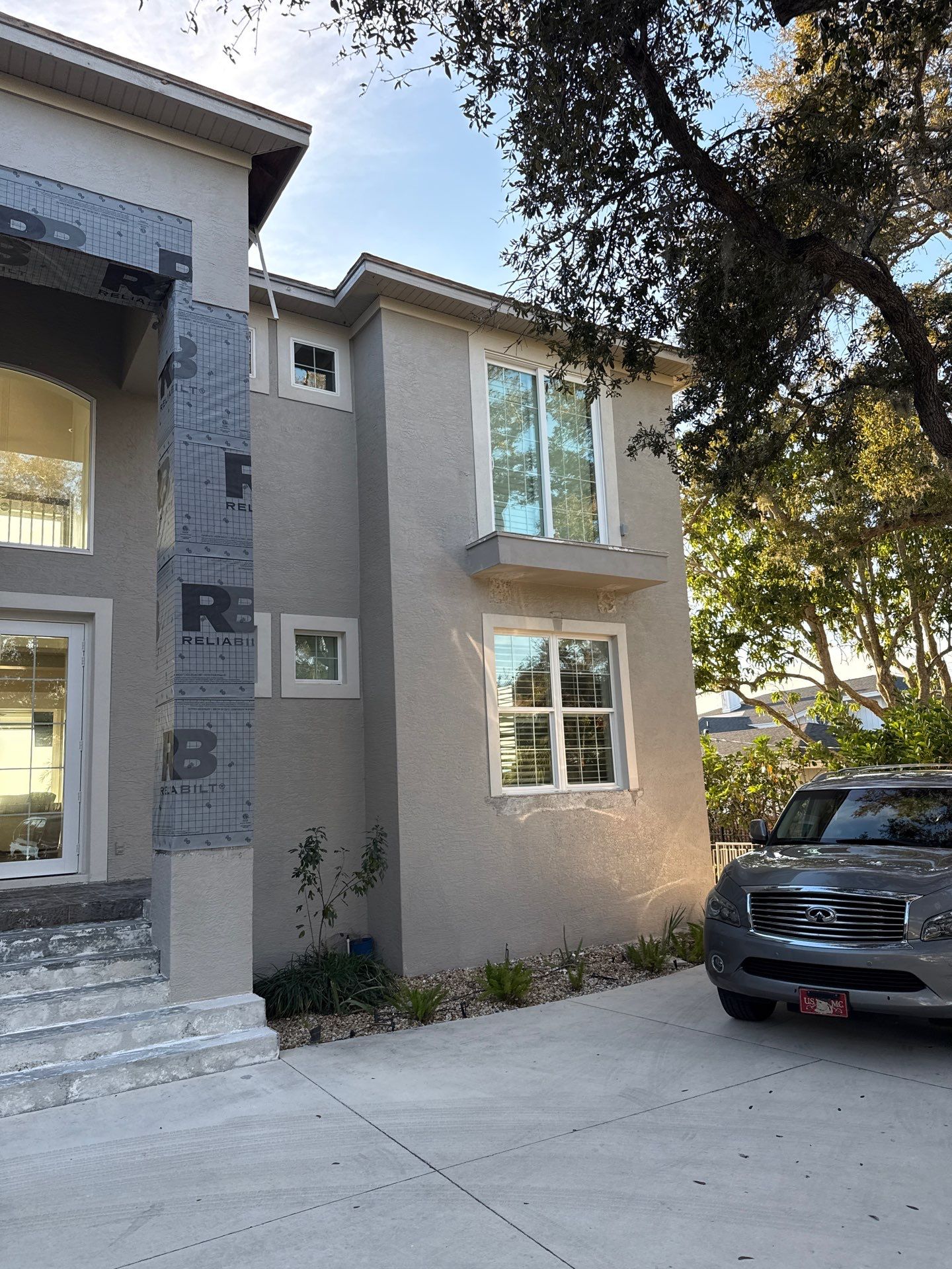Soffit and Fascia Installation and black seamless gutters in Sarasota FL by Gutter Professors