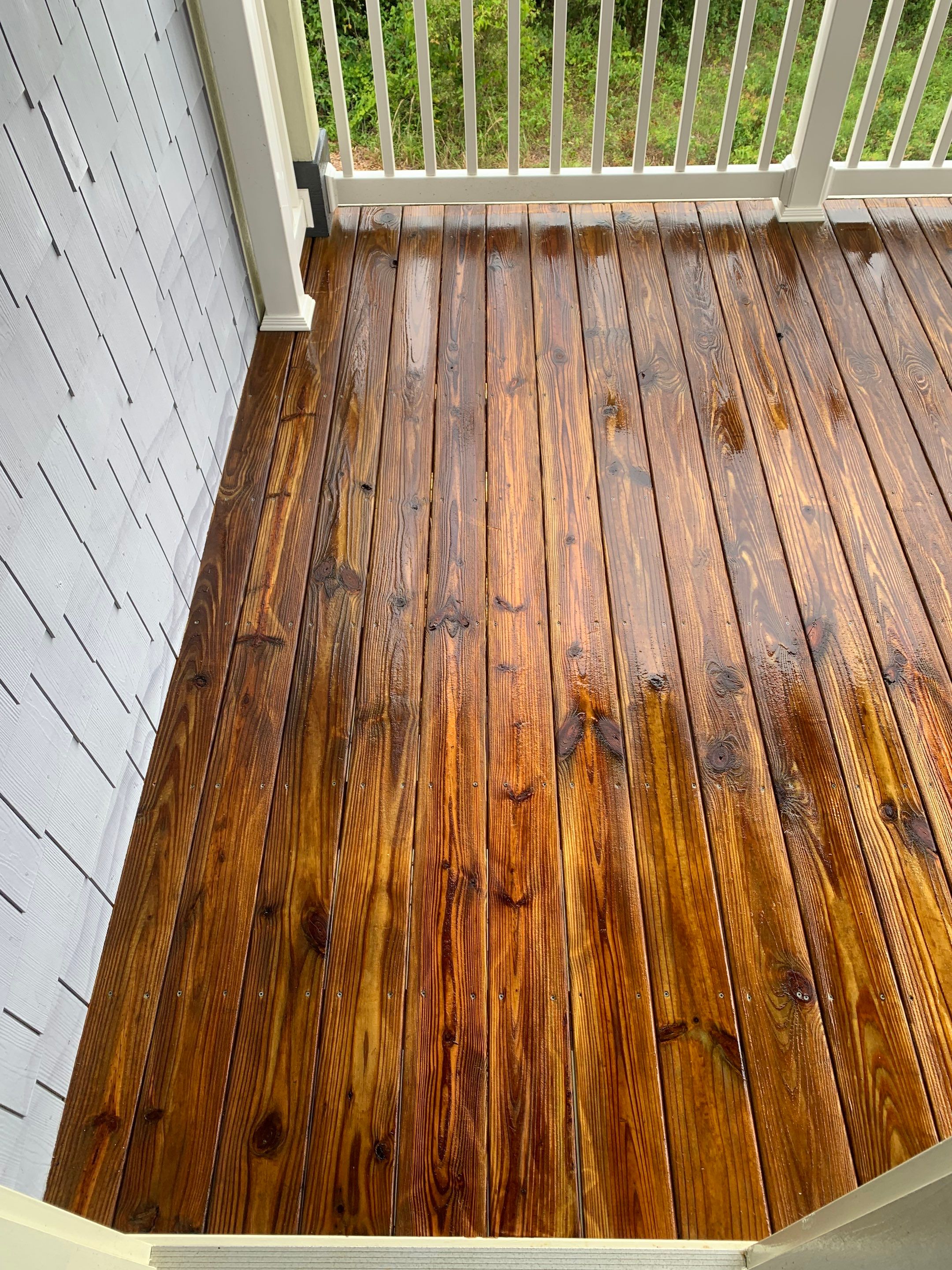 Dock, decks and carport using wood and concrete sealer by DuraSeal