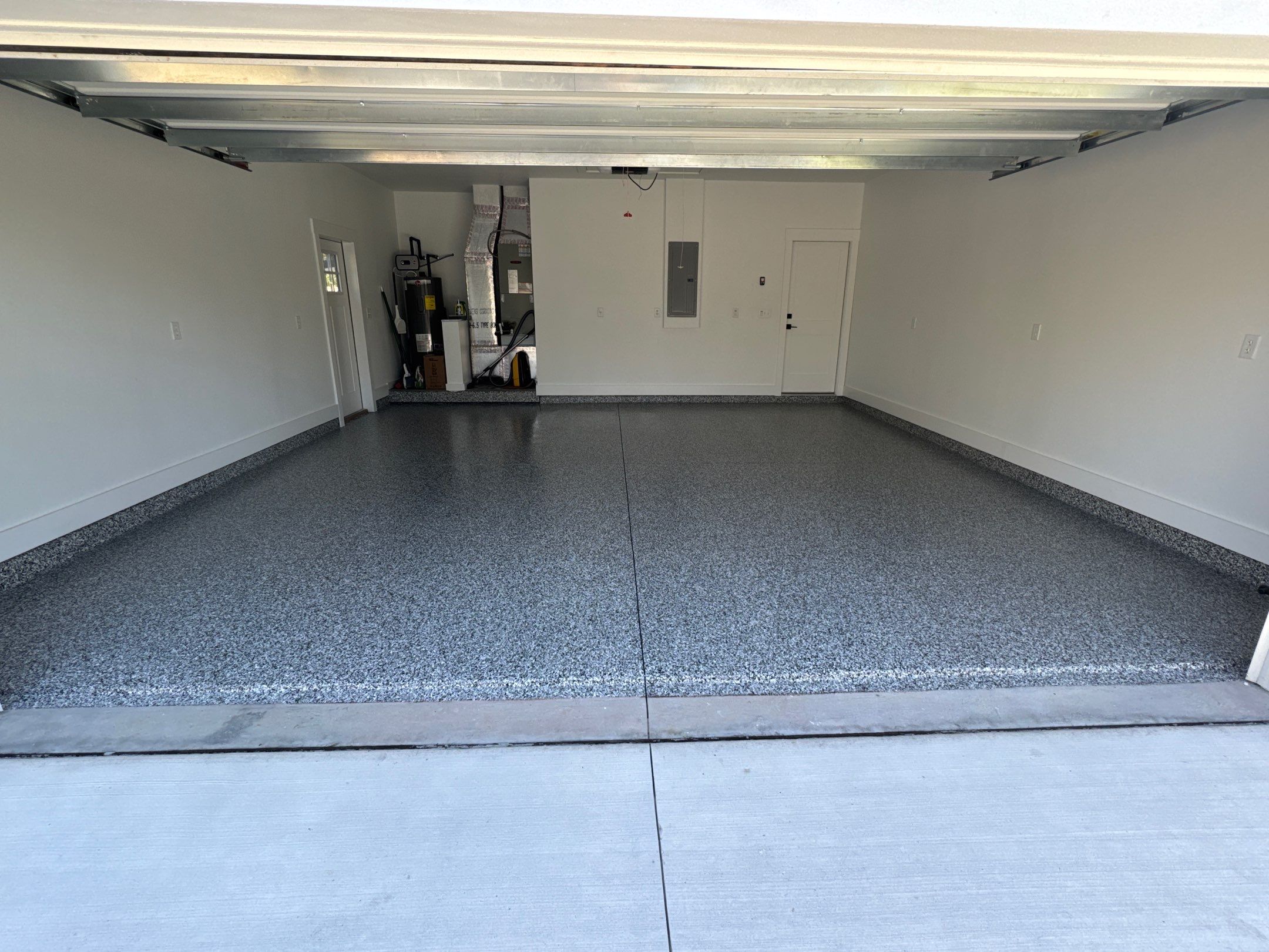 Garage in Domino by Cross Creek Concrete Coatings