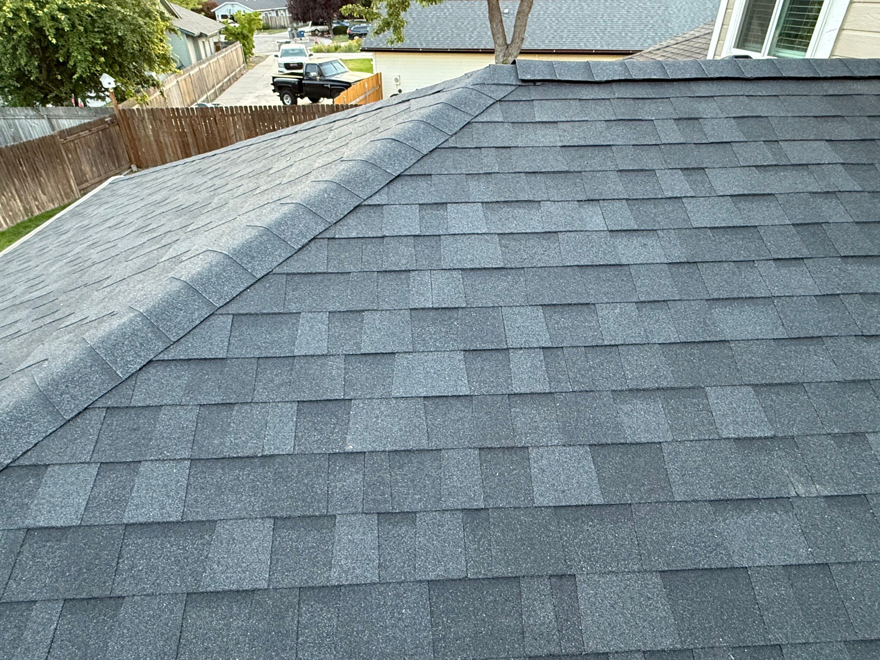 Residential Roof Replacement and Seamless Gutter Installation in Boise by Olive Roofing