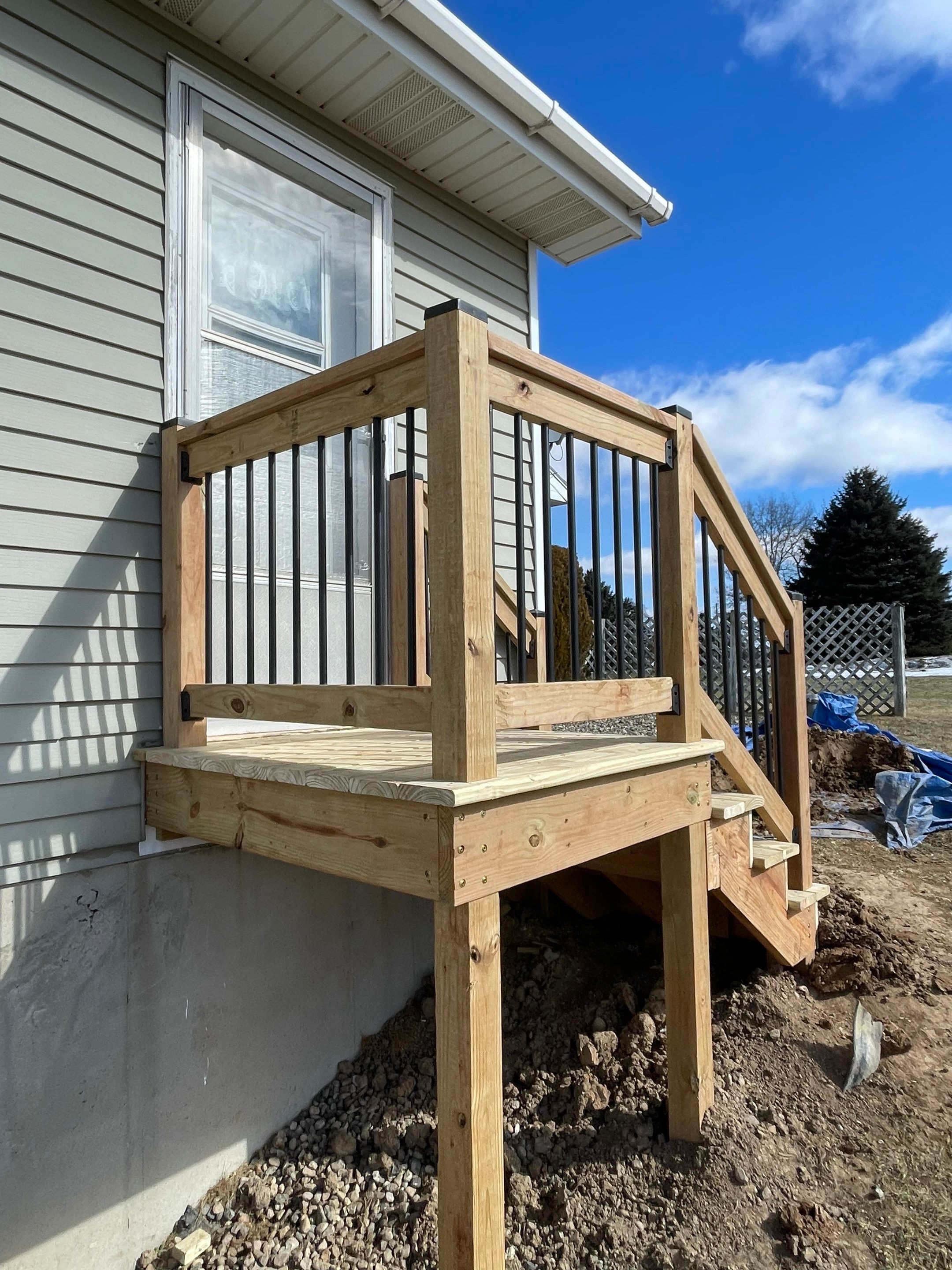 Deck Installation using Treated Lumber by Avalon Roofing and Exteriors