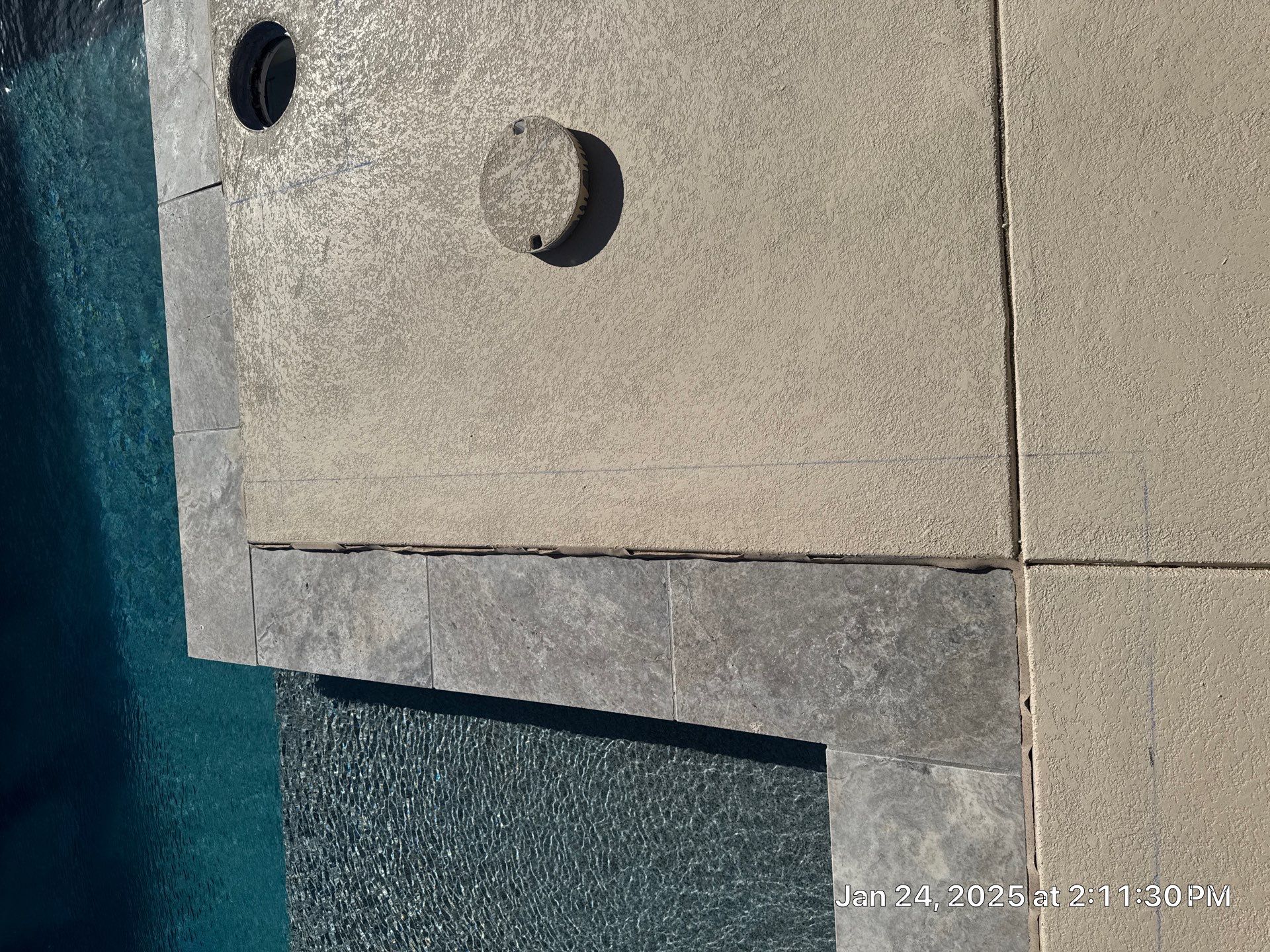 Modern Geometric Pool with Raised Stone Wall and Paver Deck by Pinnacle Pools and Spas - DFW