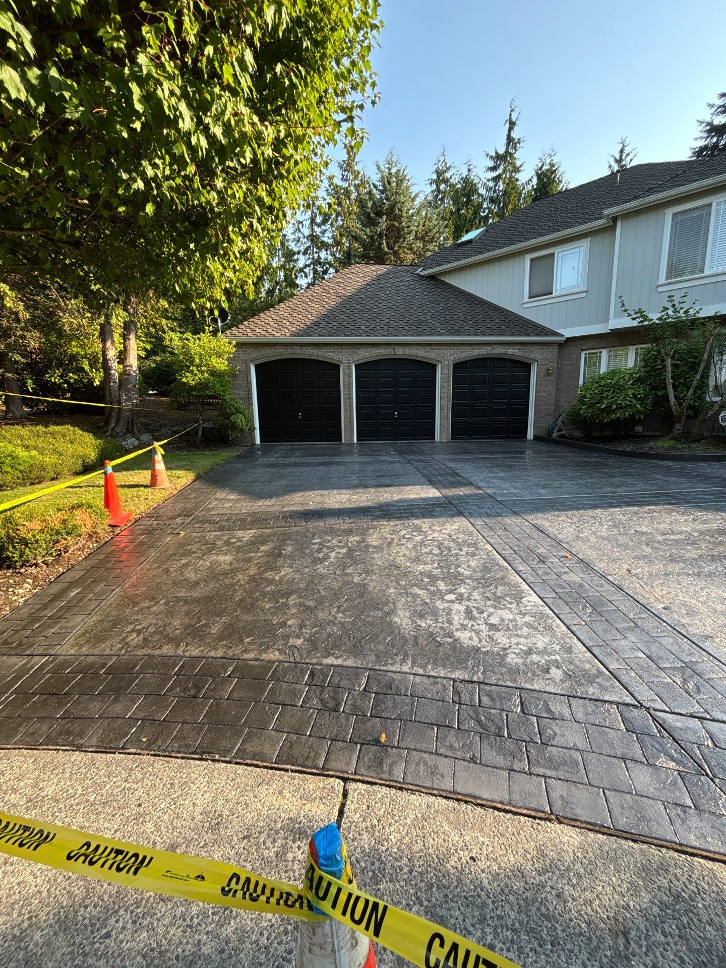 Multi-color Stamped & Sealed Concrete Driveway Renovation | Mukilteo by Jireh Asphalt & Concrete Inc