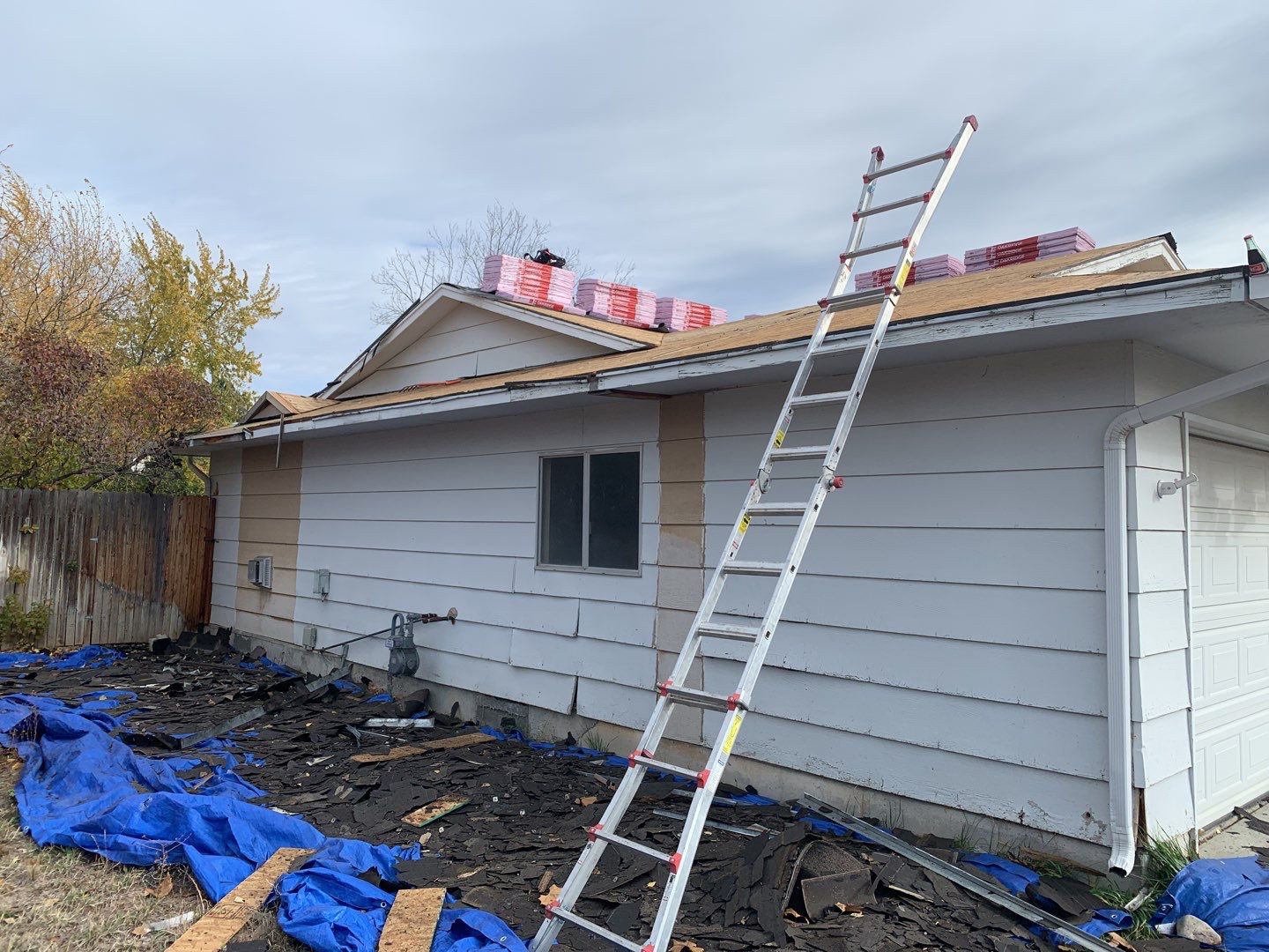 Boise single level low pitched roofing installation using Owens Corning in Teak by ID Roofing LLC