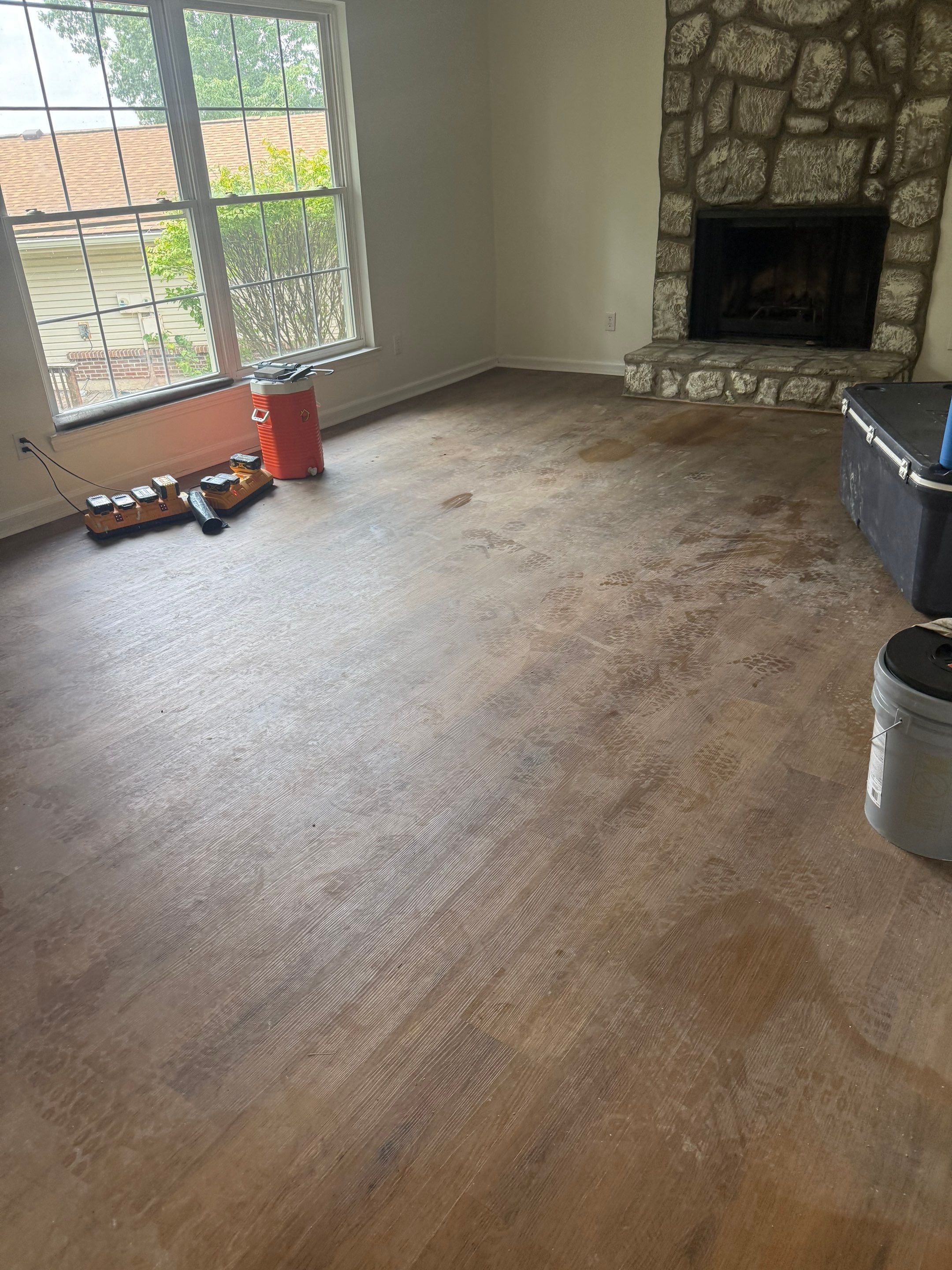 Complete Home Remodel Featuring Custom Kitchen and Wood-Look Plank Flooring by MAJO