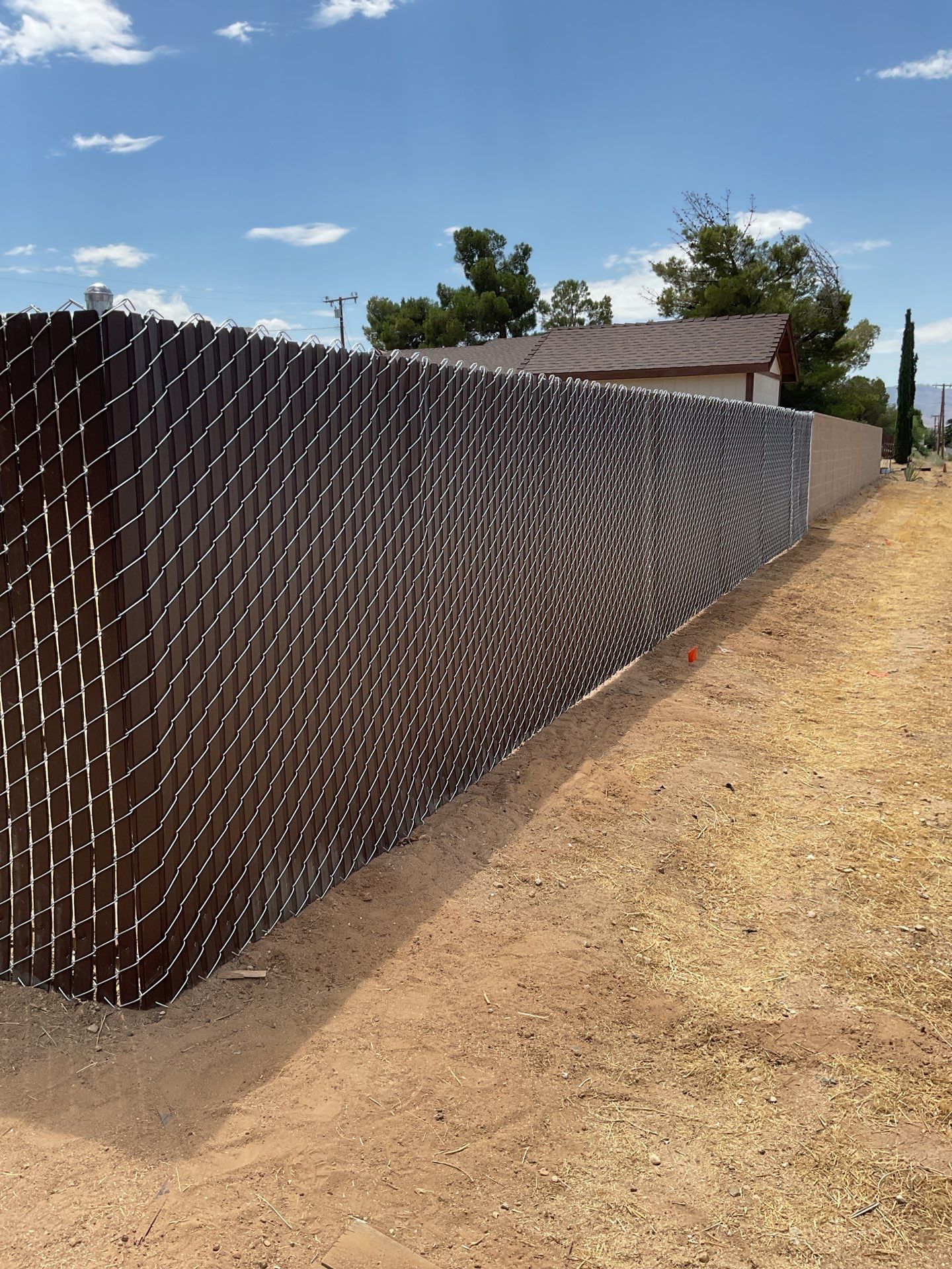 Dark Brown Privacy Chain Link Fence by Fence Guys Inc.
