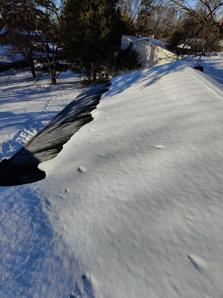 Steaming and Installing New Covers and Heating Cable by Next Level Seamless Gutters / Exteriors Inc.