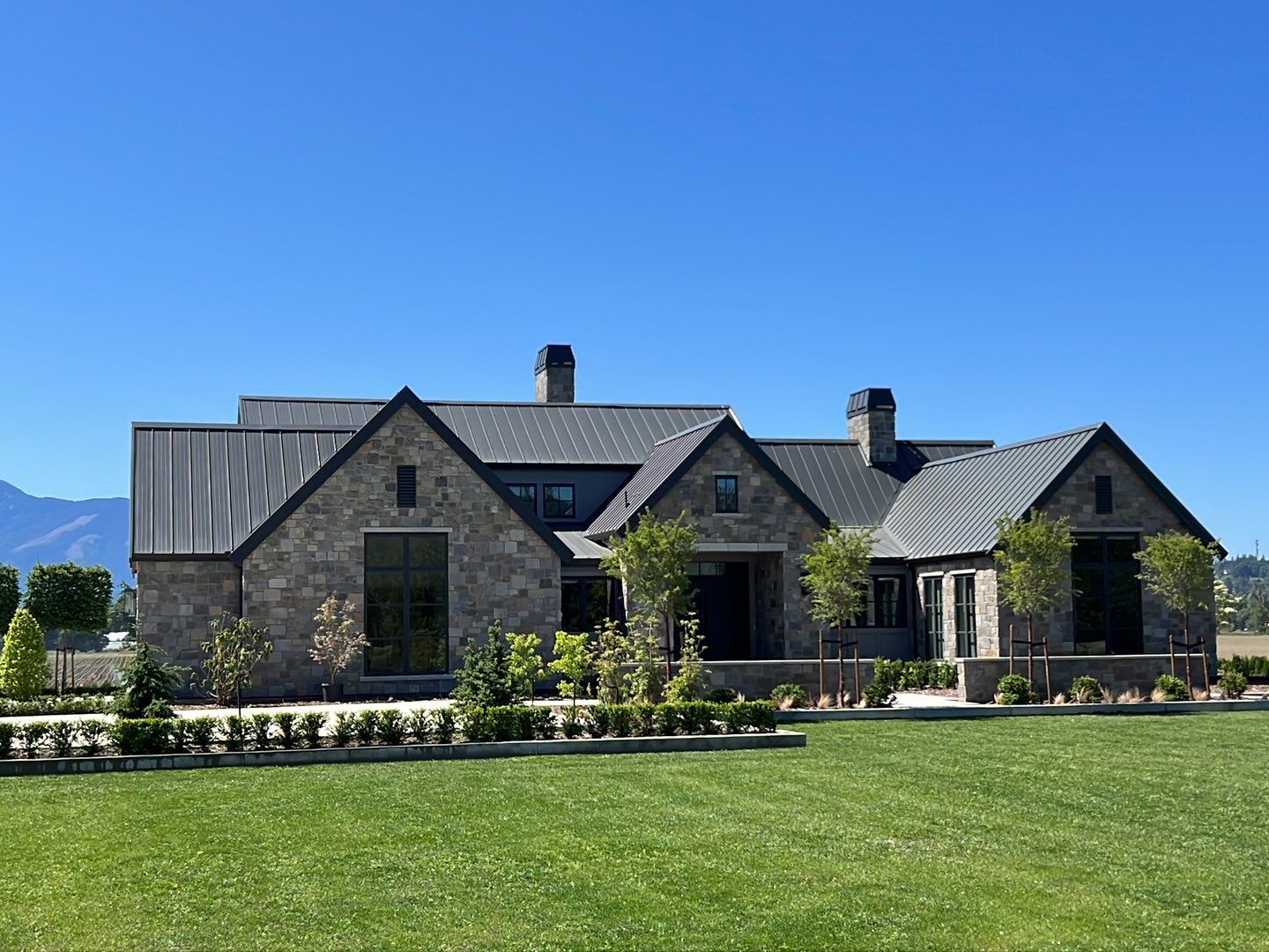 Residential Roofing Installation using 12" Prolok metal  by Top Notch Roofing Inc