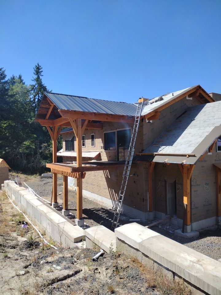 Residential Metal Roof Installation using Taylor Metal Snap Lock Metal Color: Black by Orezona Building & Roofing Company, Inc.