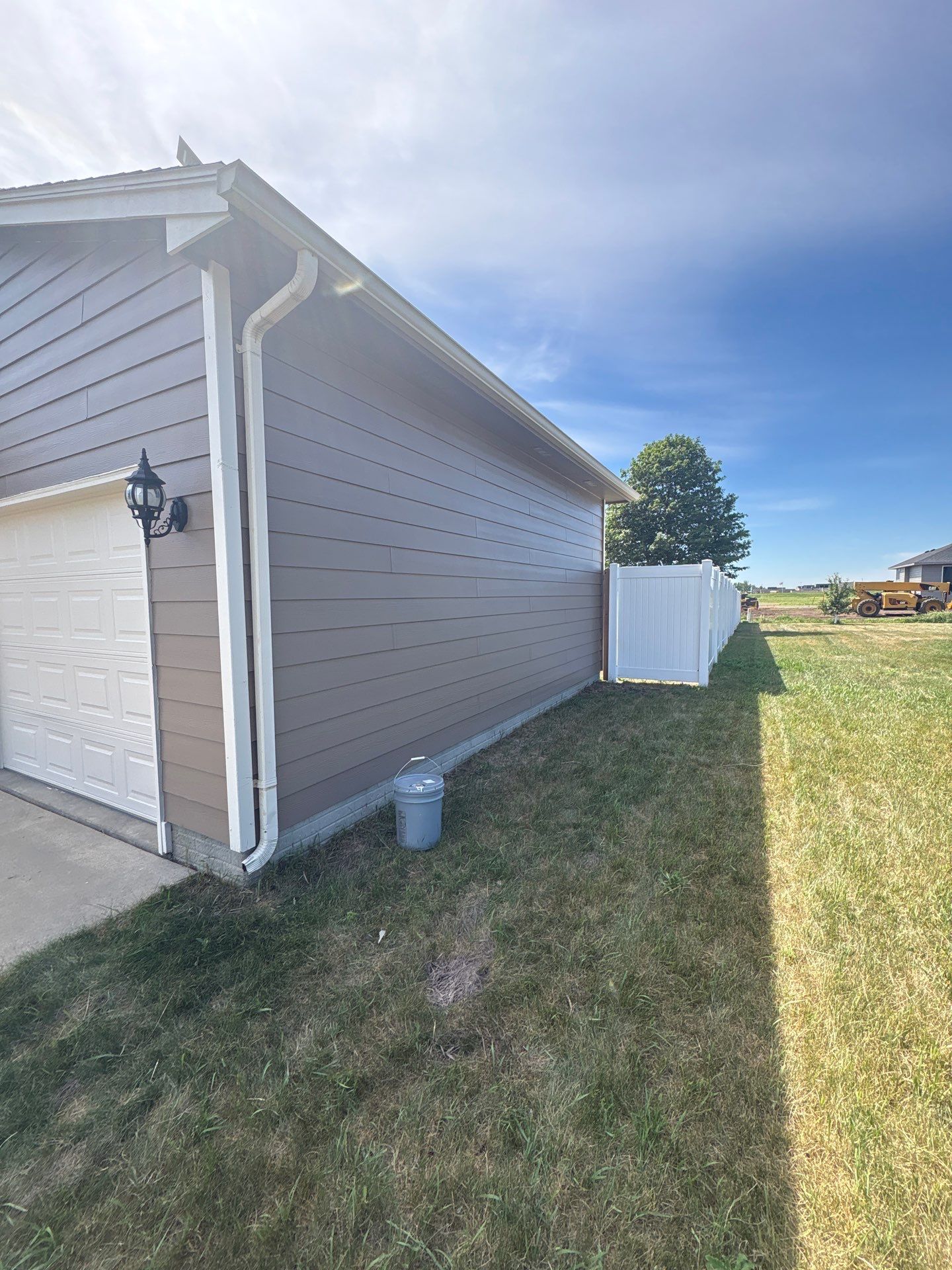 Exterior Painting and Siding Restoration for Harrisburg Residential Home by Select Painting, Coatings & Garage Cabinets