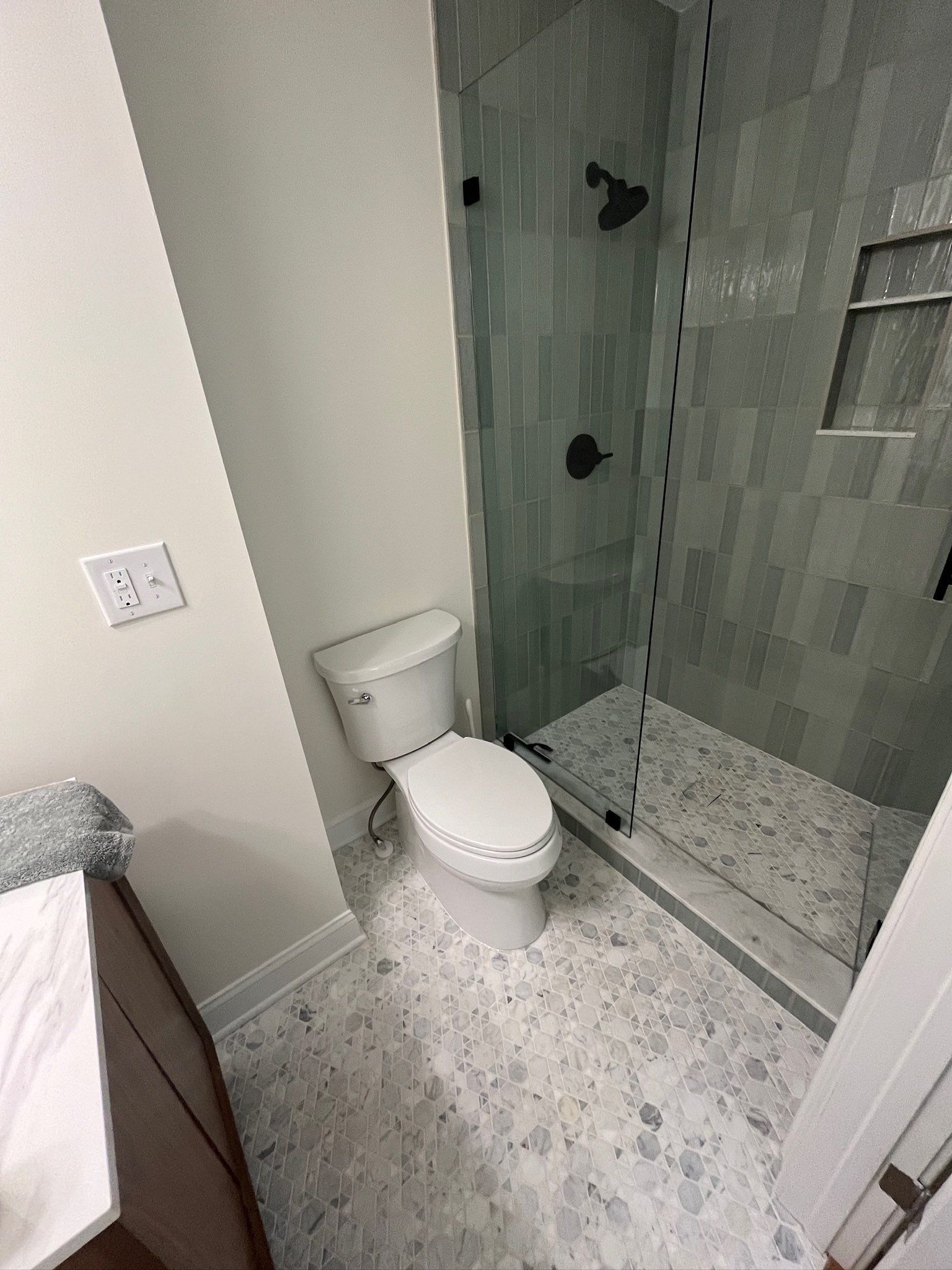 Finished Tiled Bathrooms by Next Step Contracting