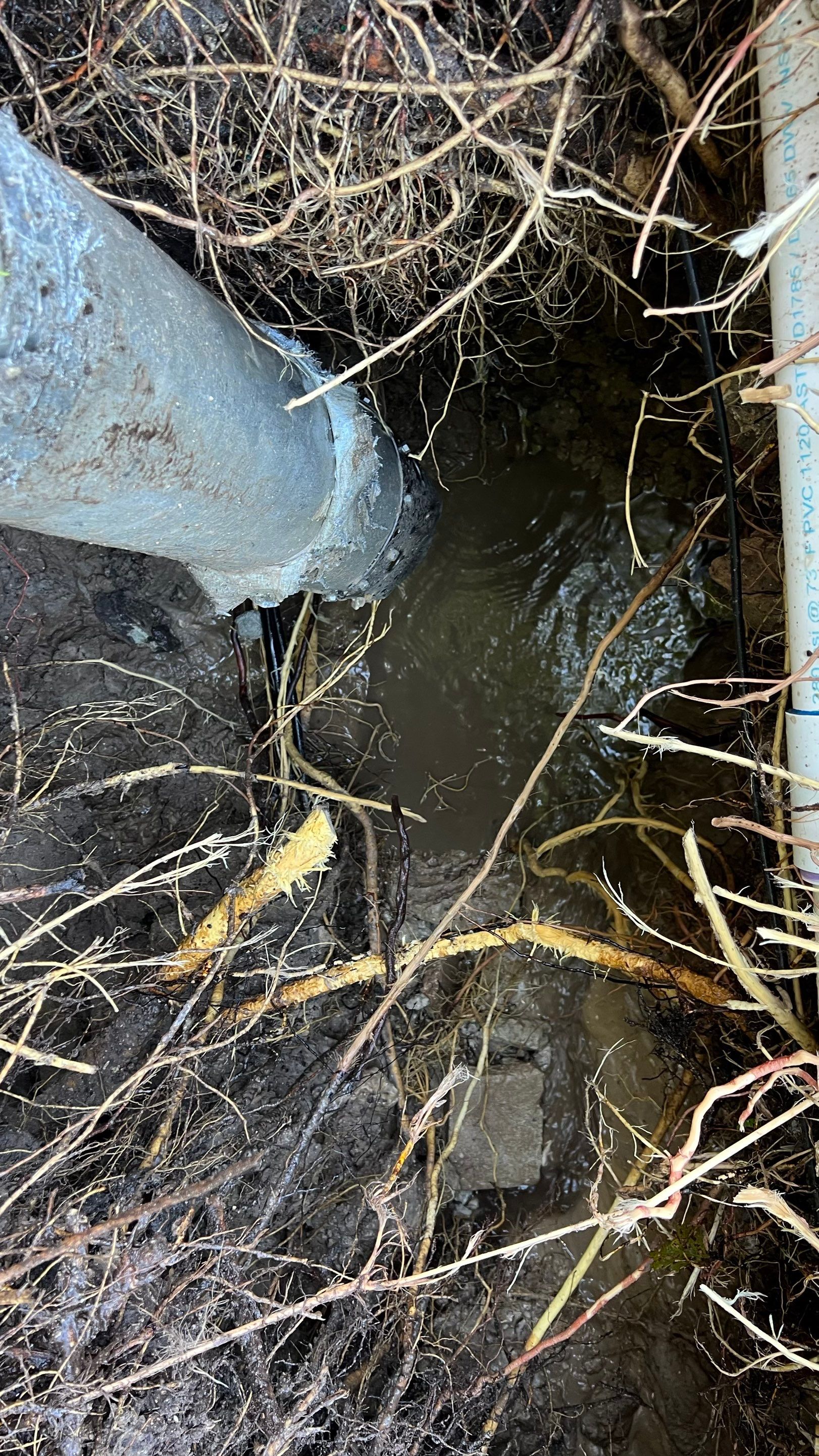 Hydro Excavating a Water Main for Repair by APS Power & Water