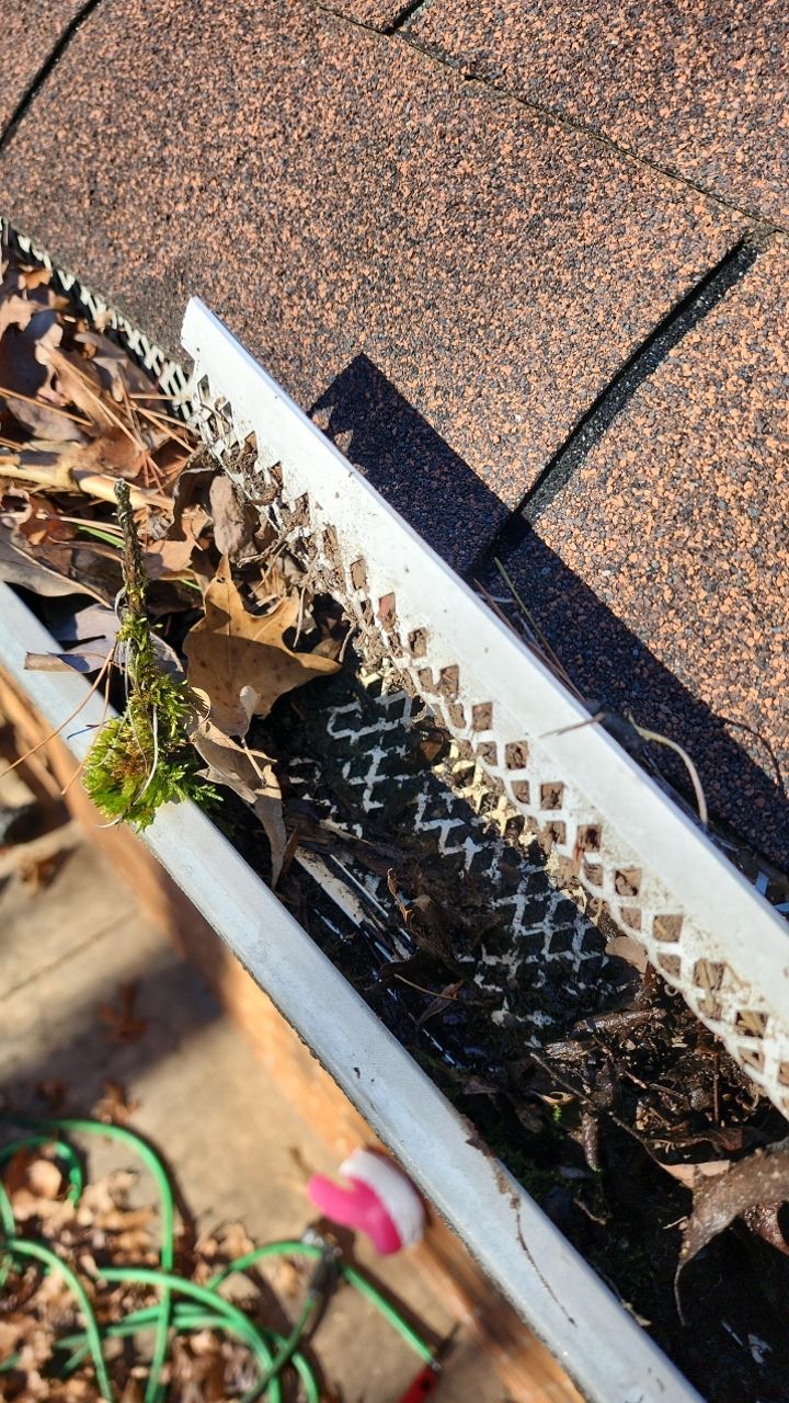 Gutter and Roof cleaning using cleaner by G&H Home Tech Pros LLC