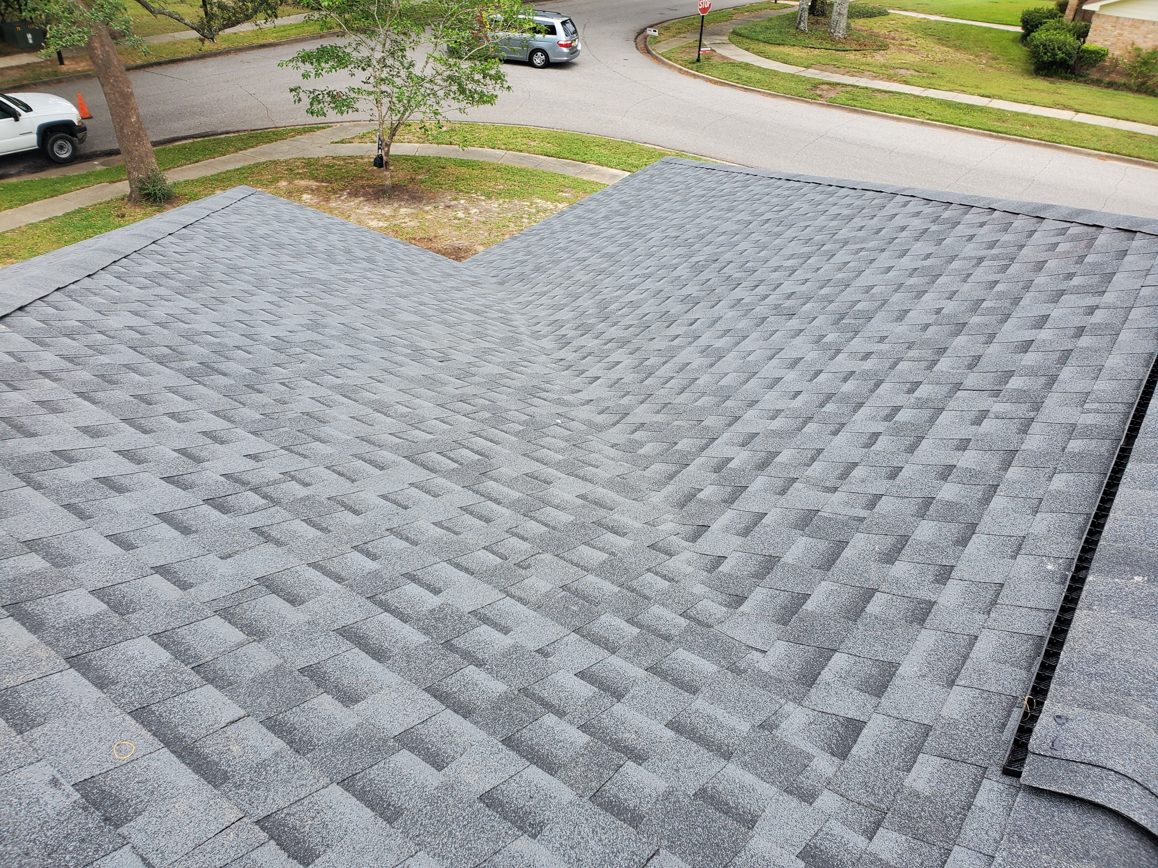 Residential Roofing Installation using Roof Replacement by American Roofing & Construction LLC
