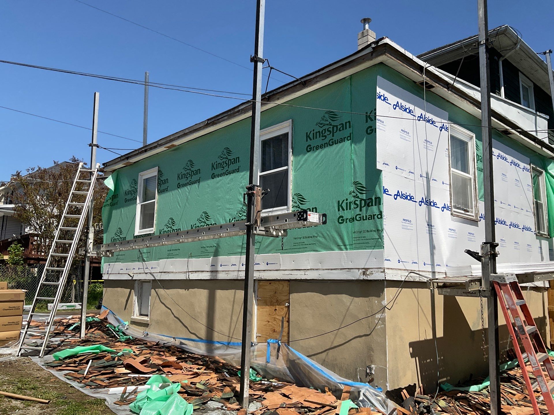 New siding & New Gutters by Alpha Design Services