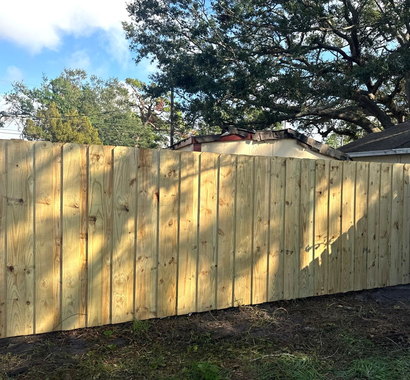 Wood Fence Installation using 6Ft Pressure Treated Wood Board On Board Privacy Fence by Asap fence and gates, LLC