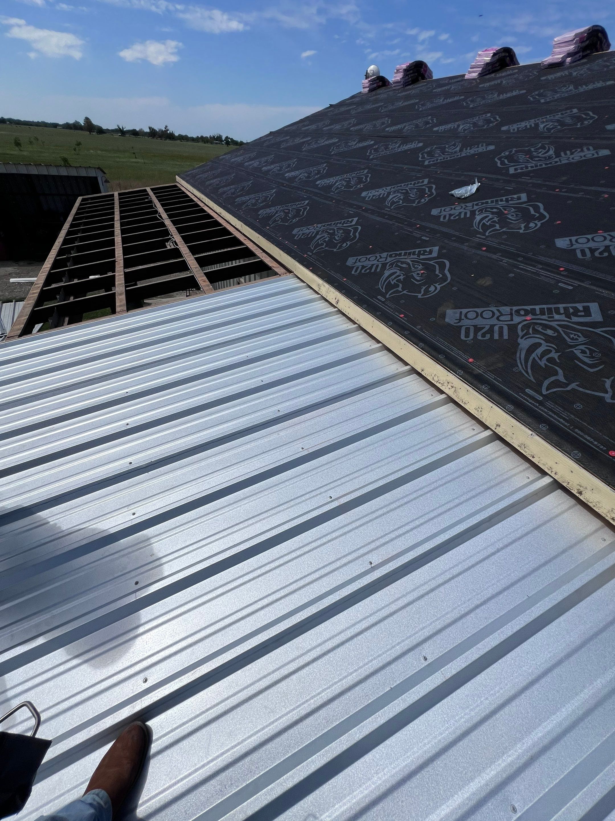 Residential Roofing Installation using Metal by Roof Repair Company