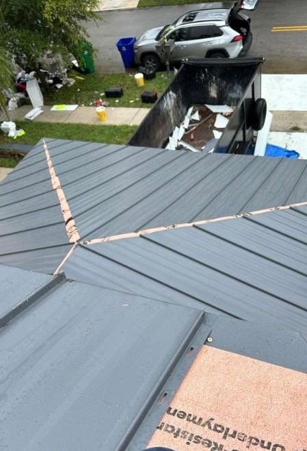 Charcoal Gray Standing Seam by Reimagine Roofing
