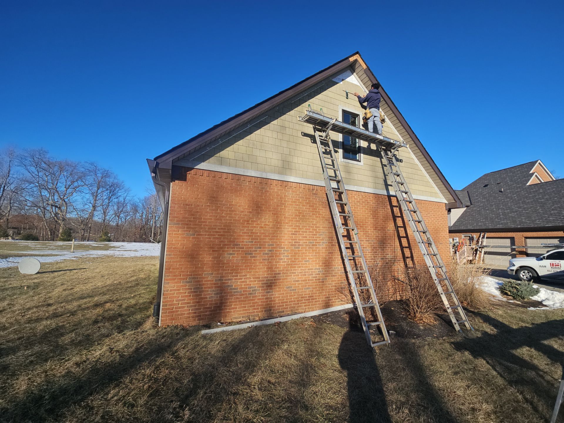 Siding Installation using James Hardie Board & Batten and James Hardie Shakes by Koontz Construction