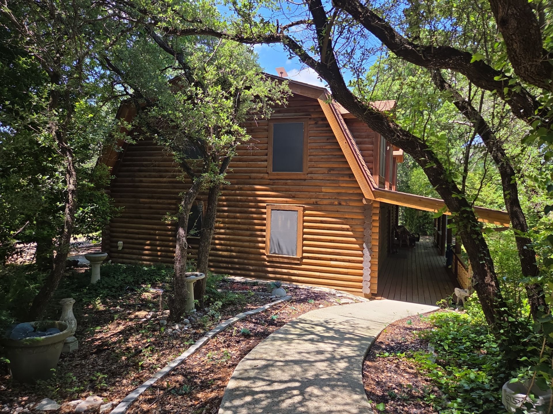Fort Worth Log Home Roof Replacement and Gutter System Service by Performance 1 Roofing
