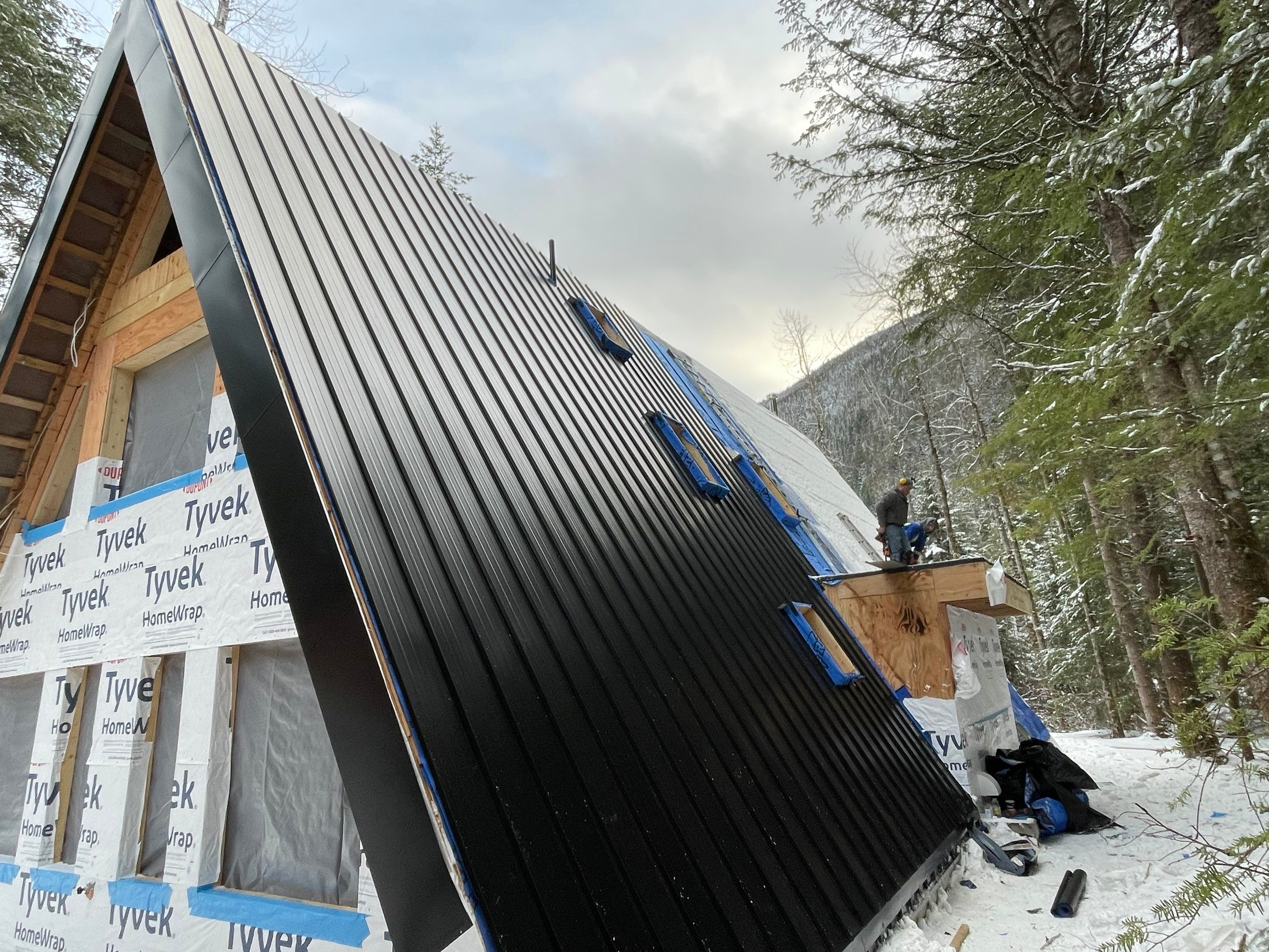 Residential Roofing Installation using 12" Prolok metal  by Top Notch Roofing Inc