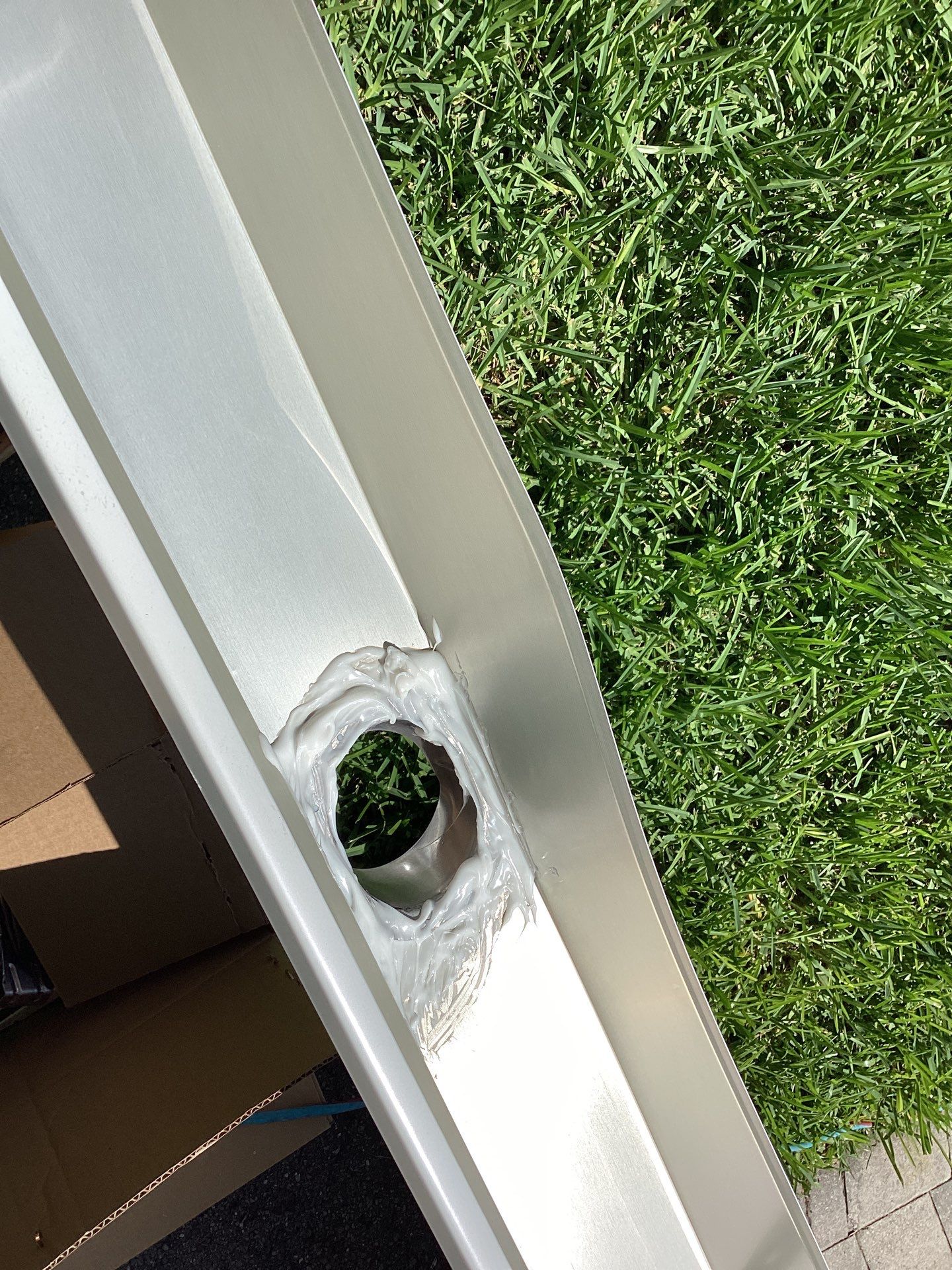 White Gutter Installation in Sarasota FL by Gutter Professors