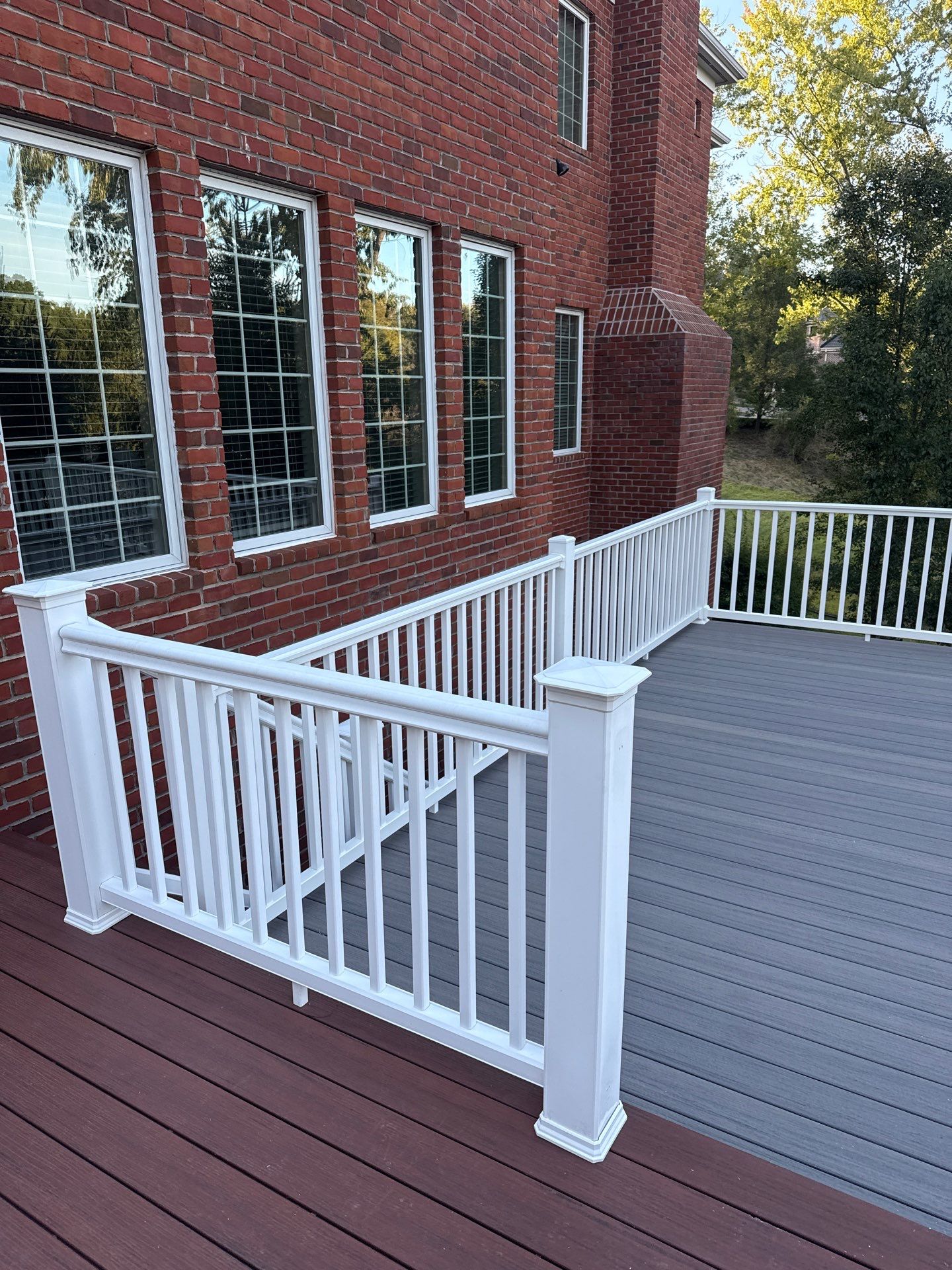 Deck extension  by Cousins Roofing Siding & Decks