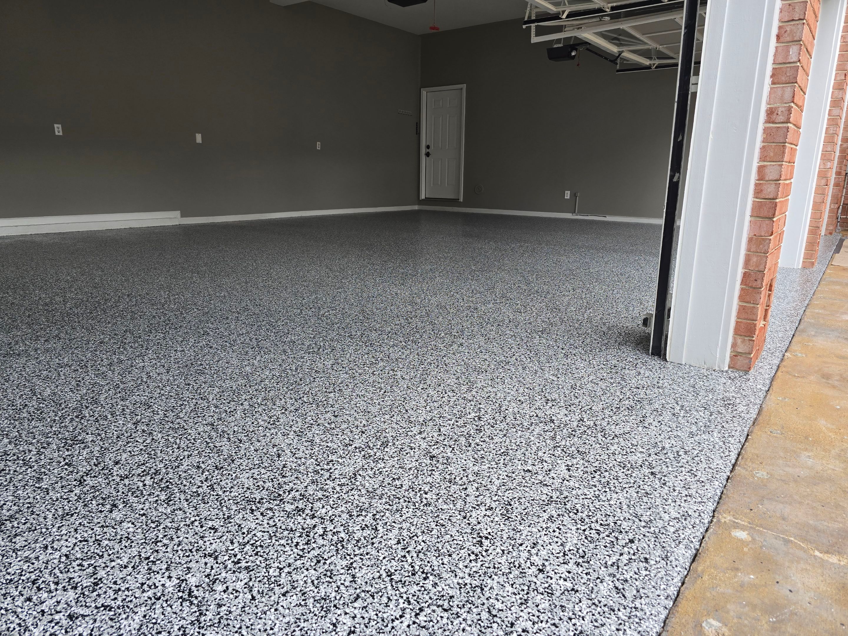 Garage using Domino by Elite Floor Solutions