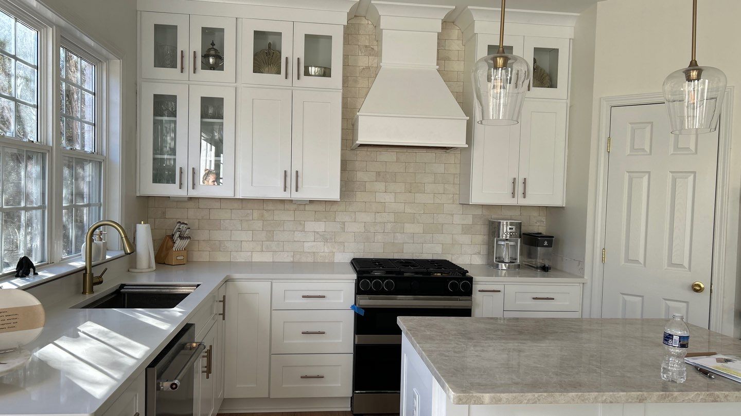Lovely neutral backsplash  by Footprints Floors of Nashville